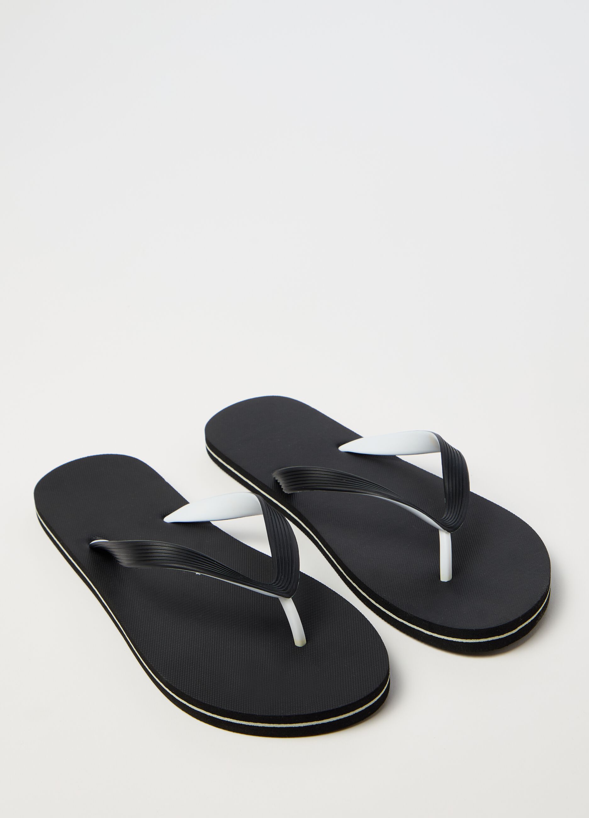 Thong sandals with striped straps