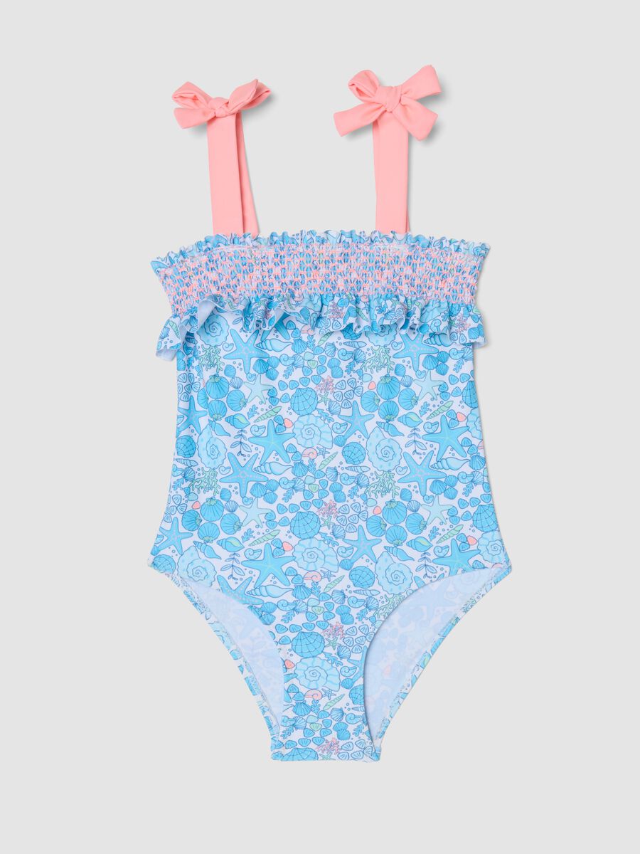 Fato de banho azul de menina, inteiro, em tecido el&aacute;stico com estampado marinho_0