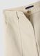 Pantaloni beige flare in cotone elasticizzato_1