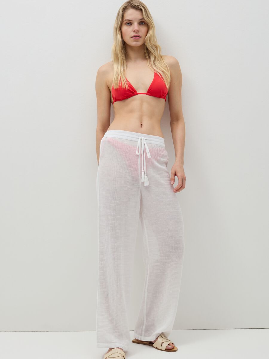 Beach cover-up trousers with tassels_0