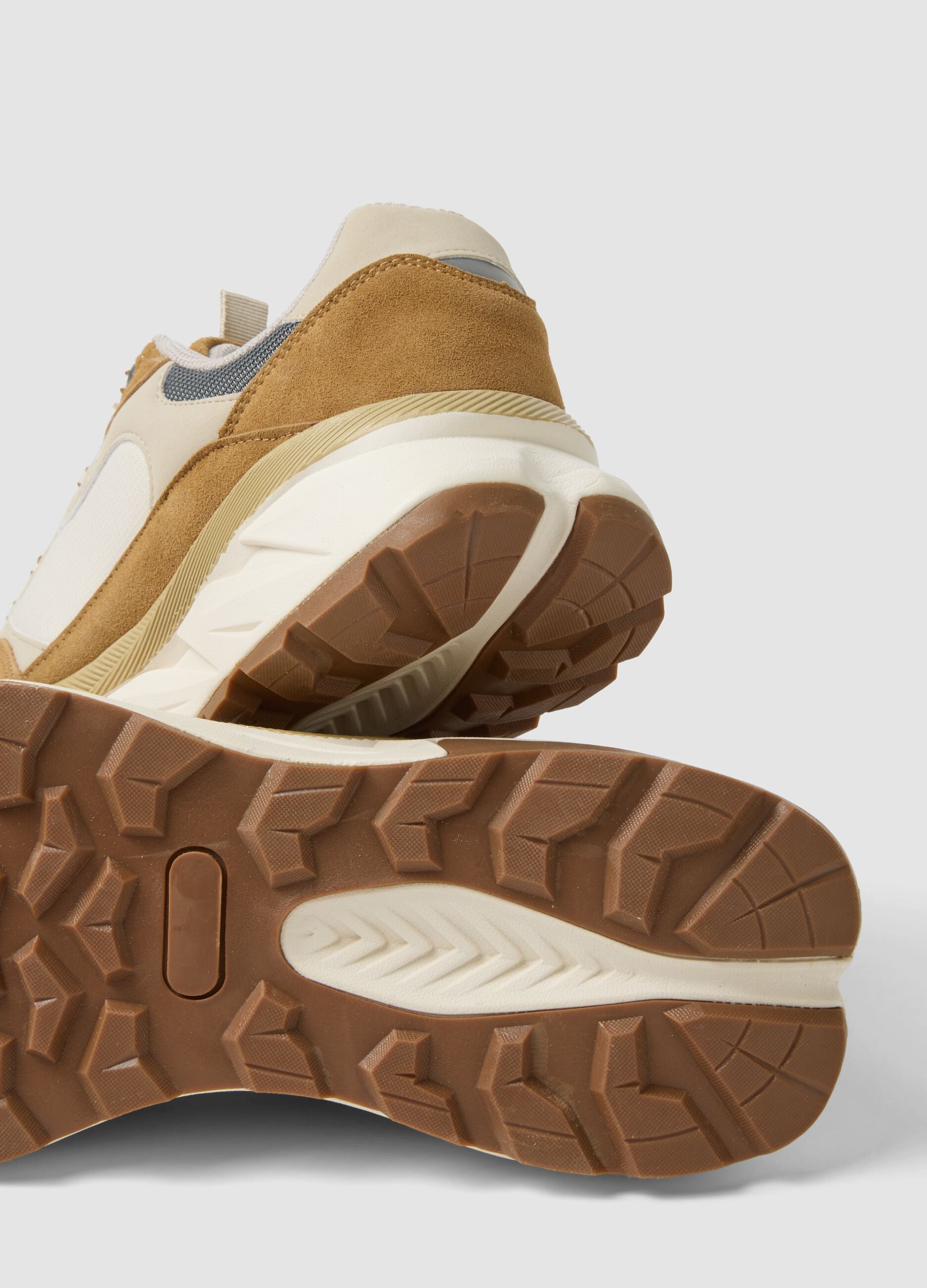 Beige lace-up trainers with contrast inserts