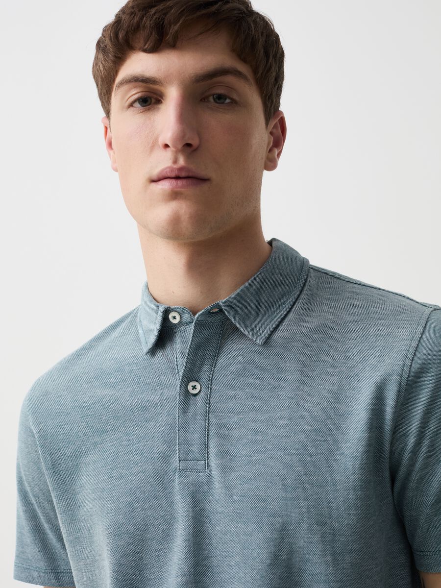 Piquet polo shirt with two-tone jacquard weave_1