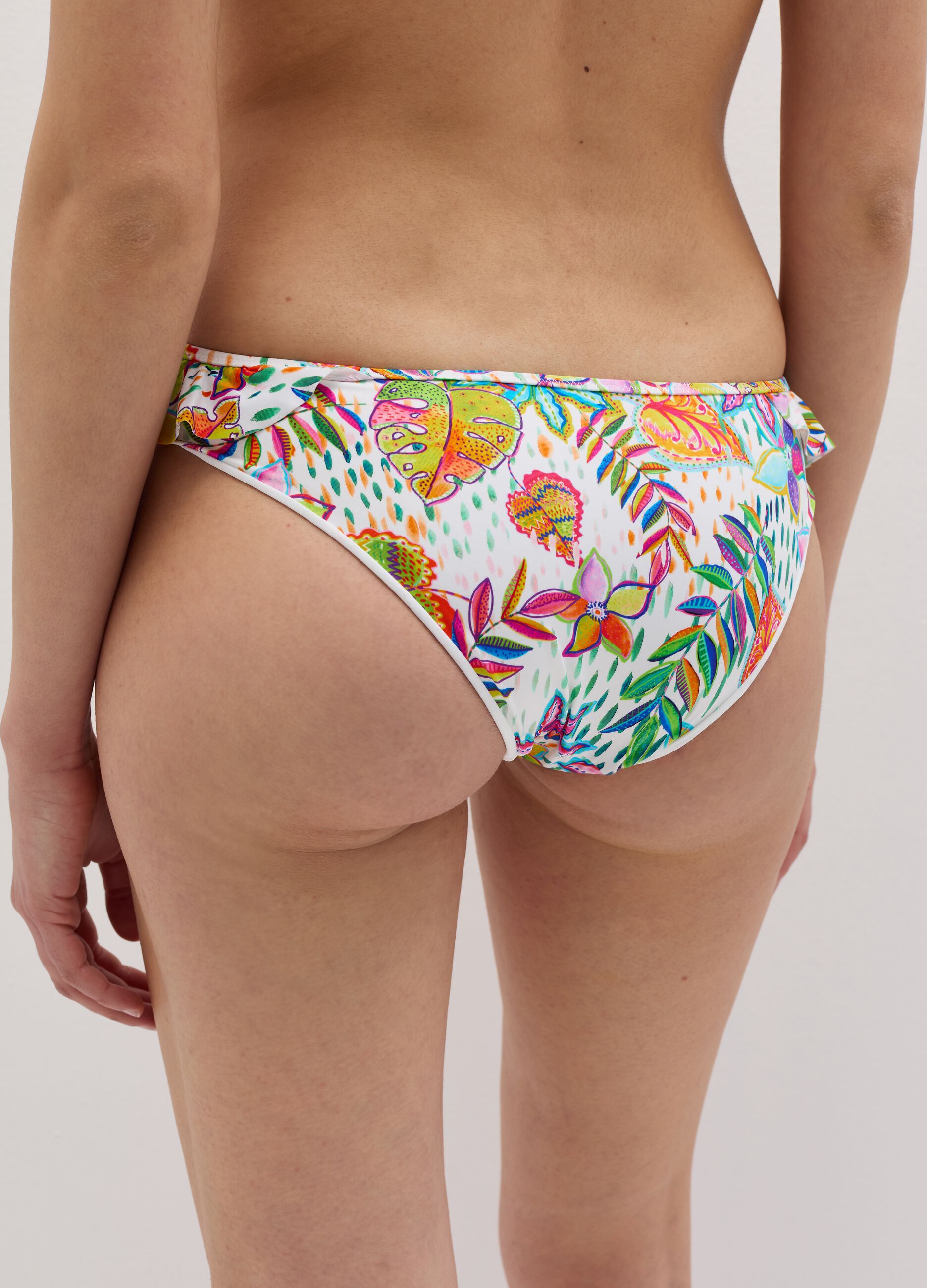 Bikini briefs with flounce and tropical print