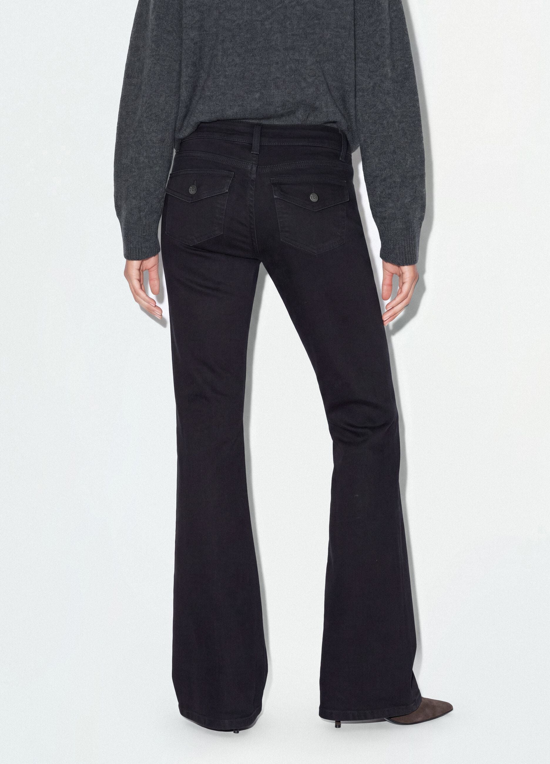 Jeans neri flare in cotone elasticizzato