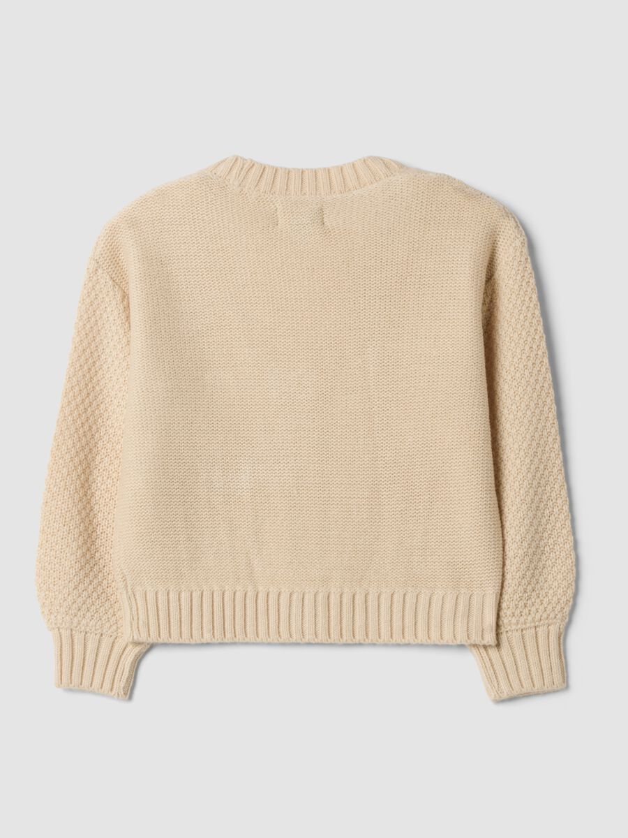 Cardigan beige in maglia con scollo profondo a V_1