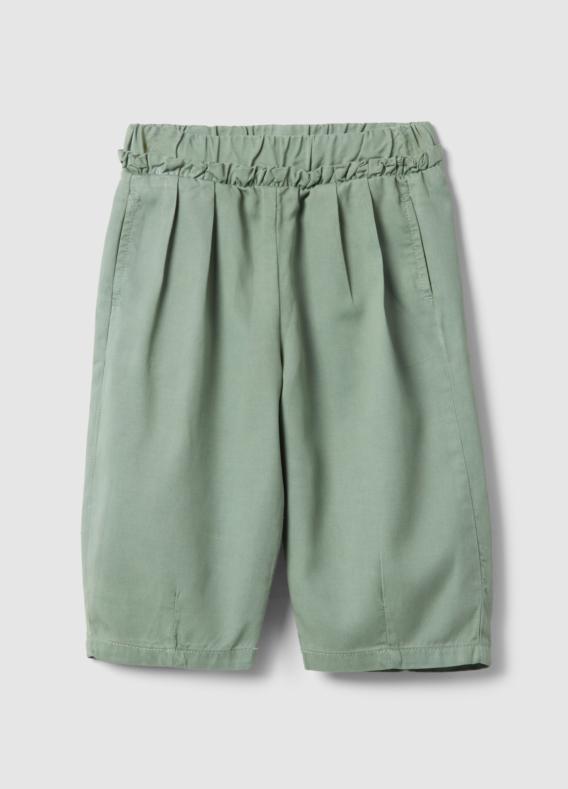 Green girl's baggy trousers in lyocell and cotton