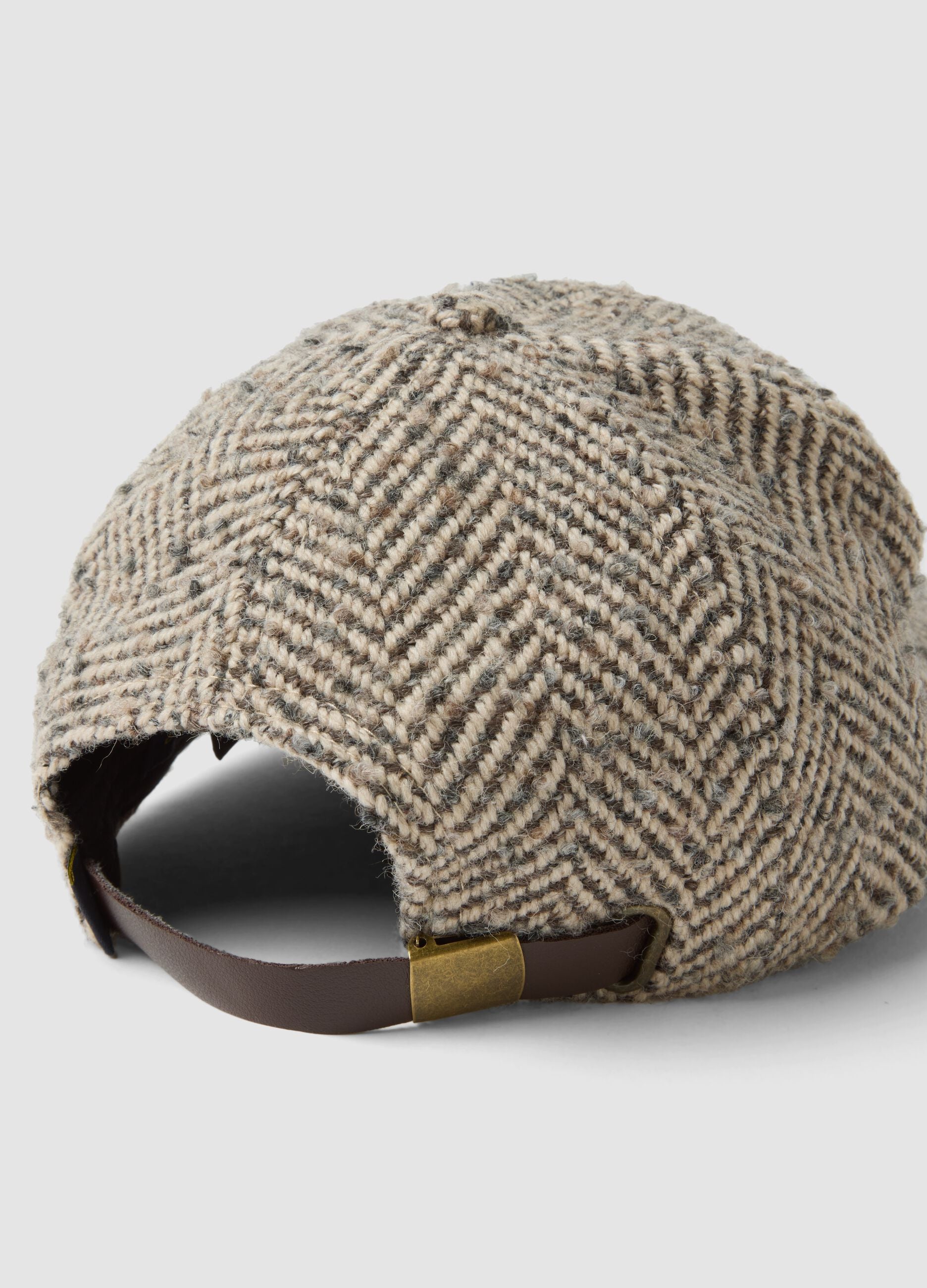 Beige wool-blend cap with patterned design