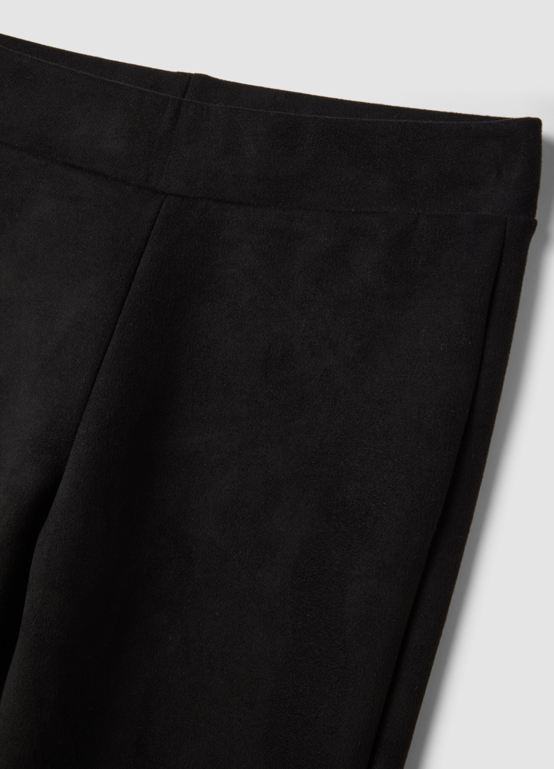 Black flared leggings in stretch fabric