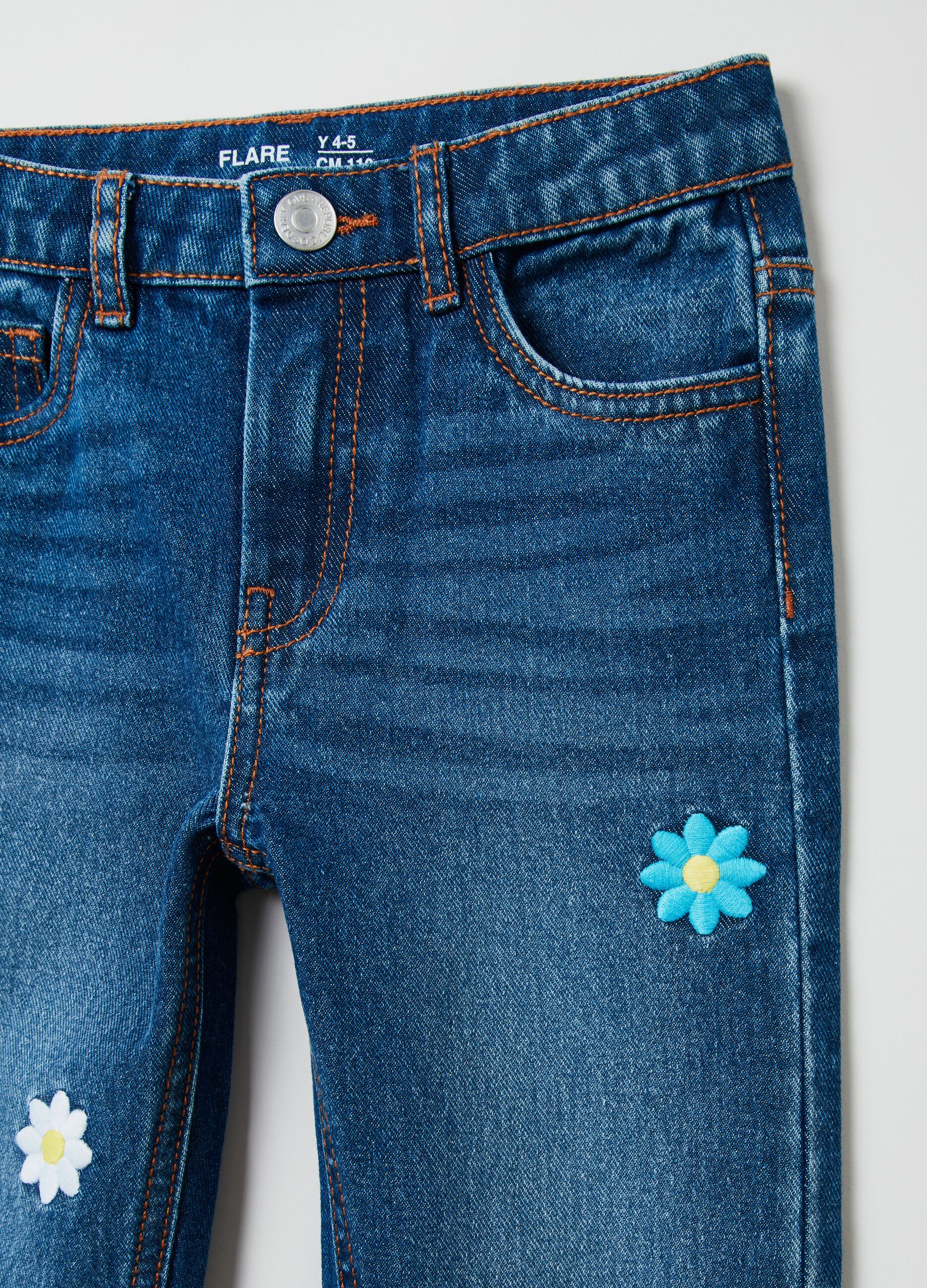 Flare-fit jeans with embroidered daisies
