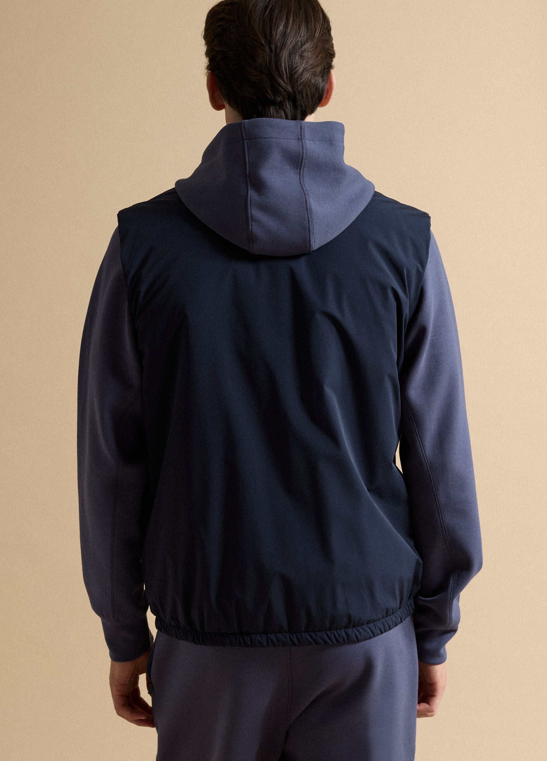 Blue stretch-fabric gilet with zip