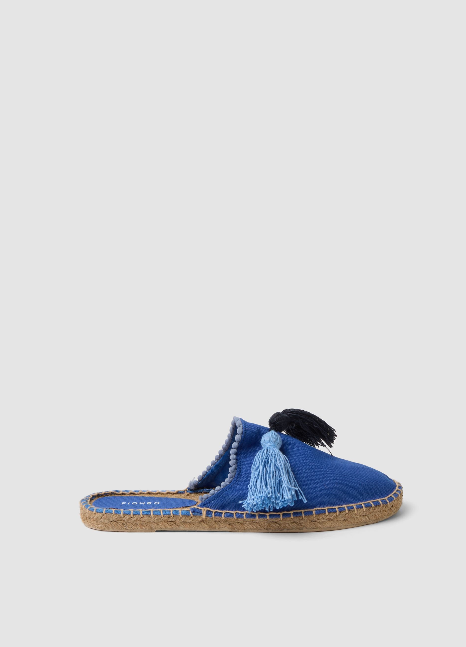 Blue mules with tassels