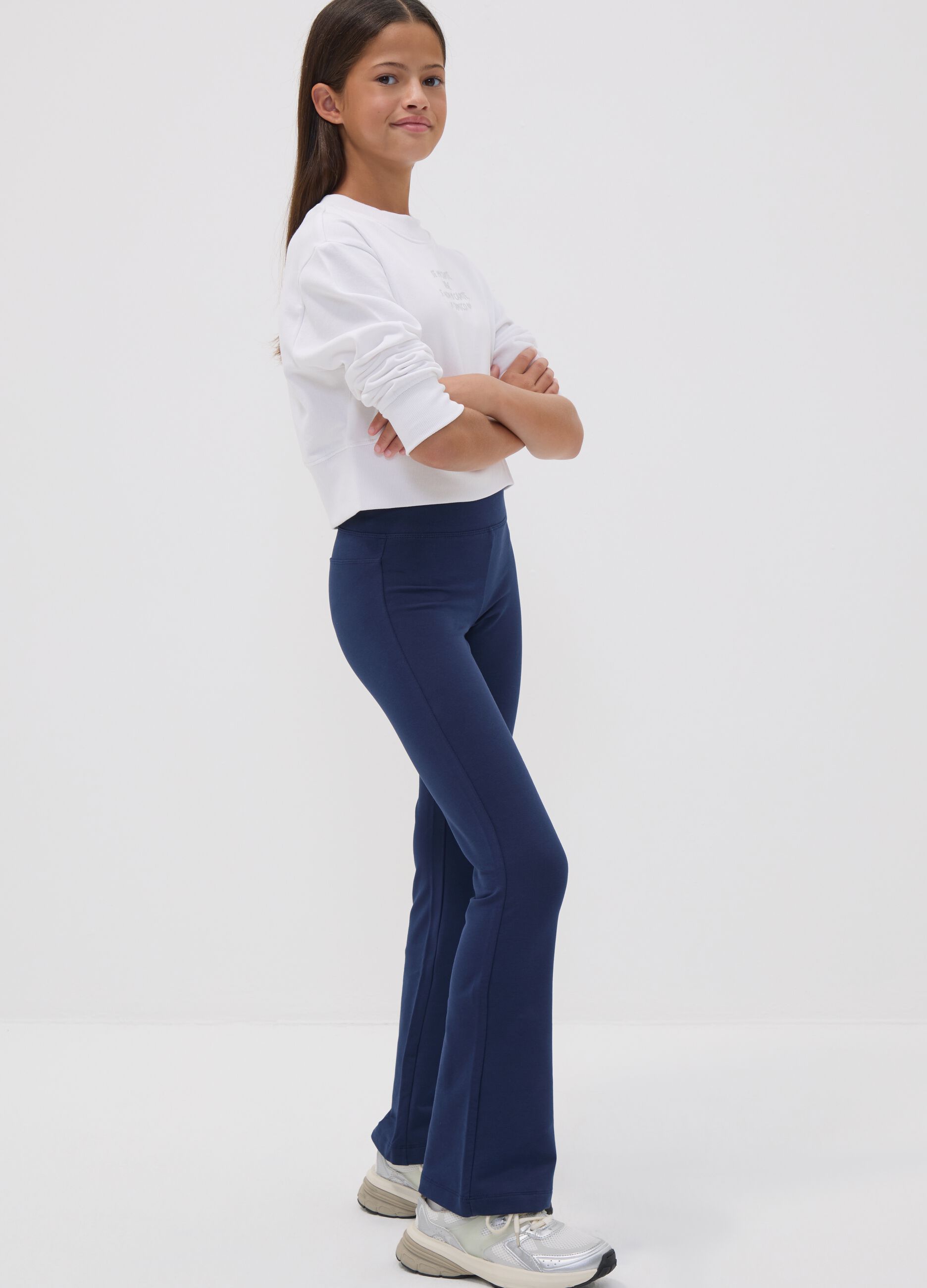 Girls&rsquo; blue flared trousers in stretch organic cotton