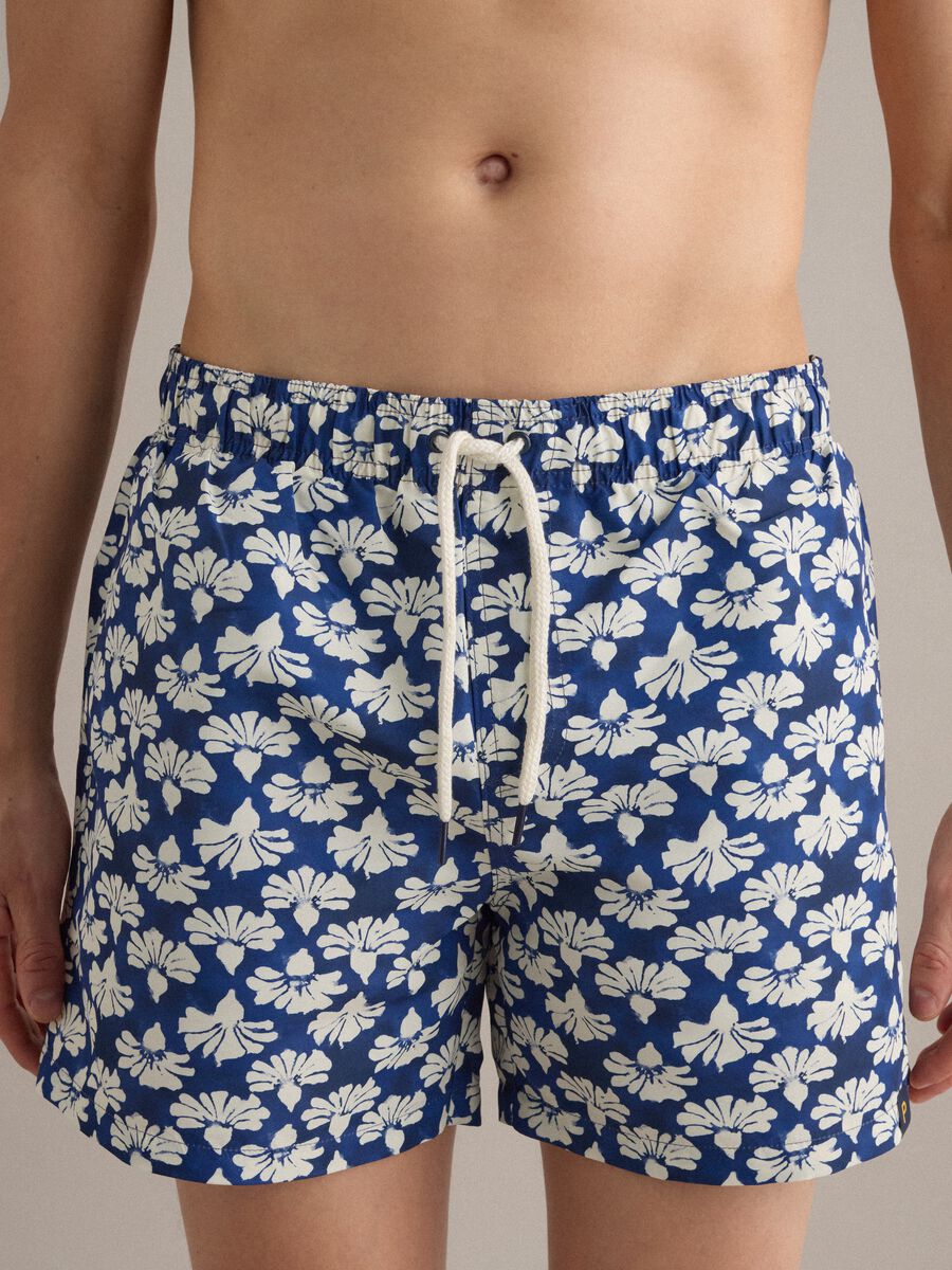 Blue floral-print swim shorts_1