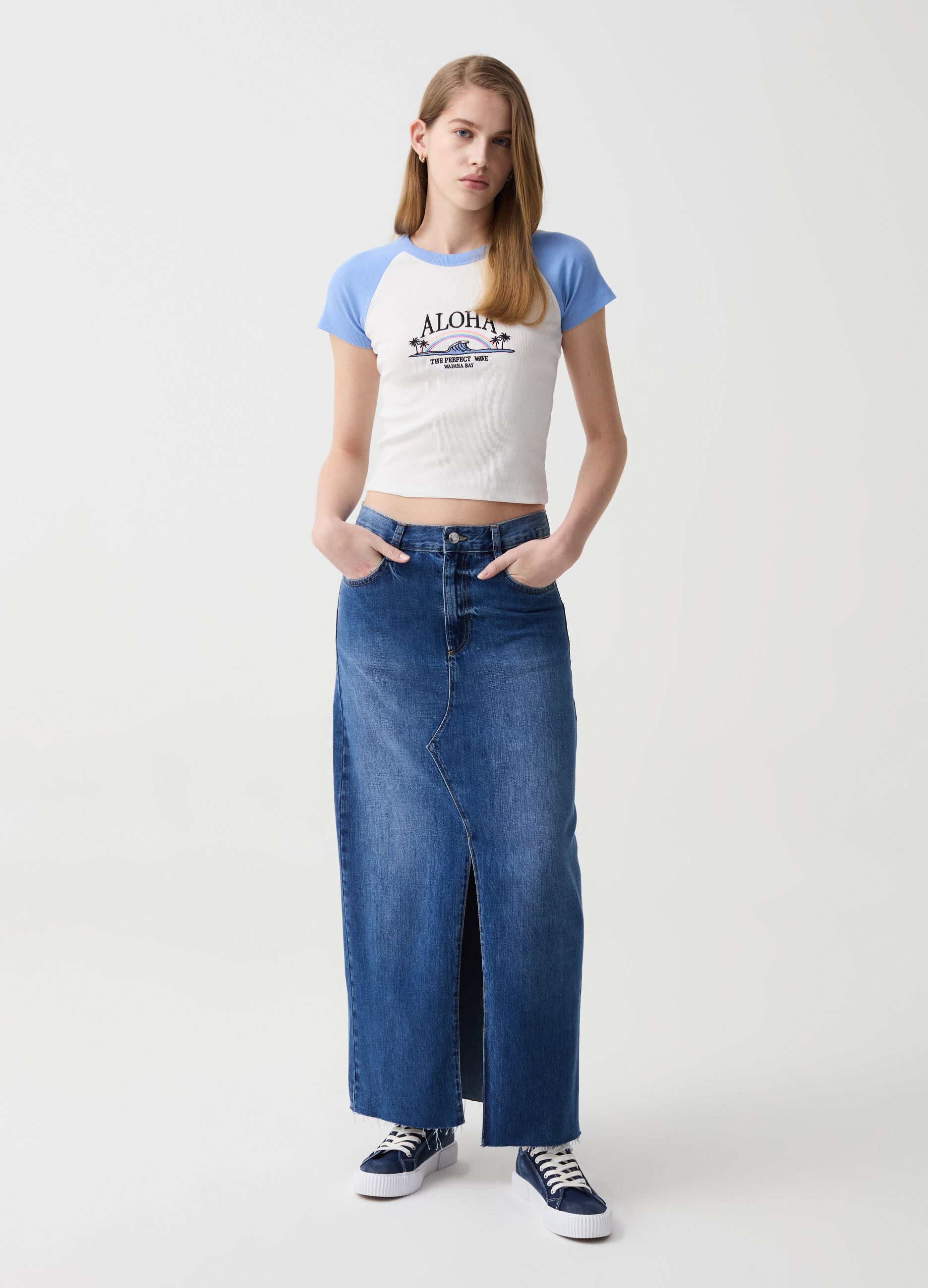Long skirt in denim with raw edging