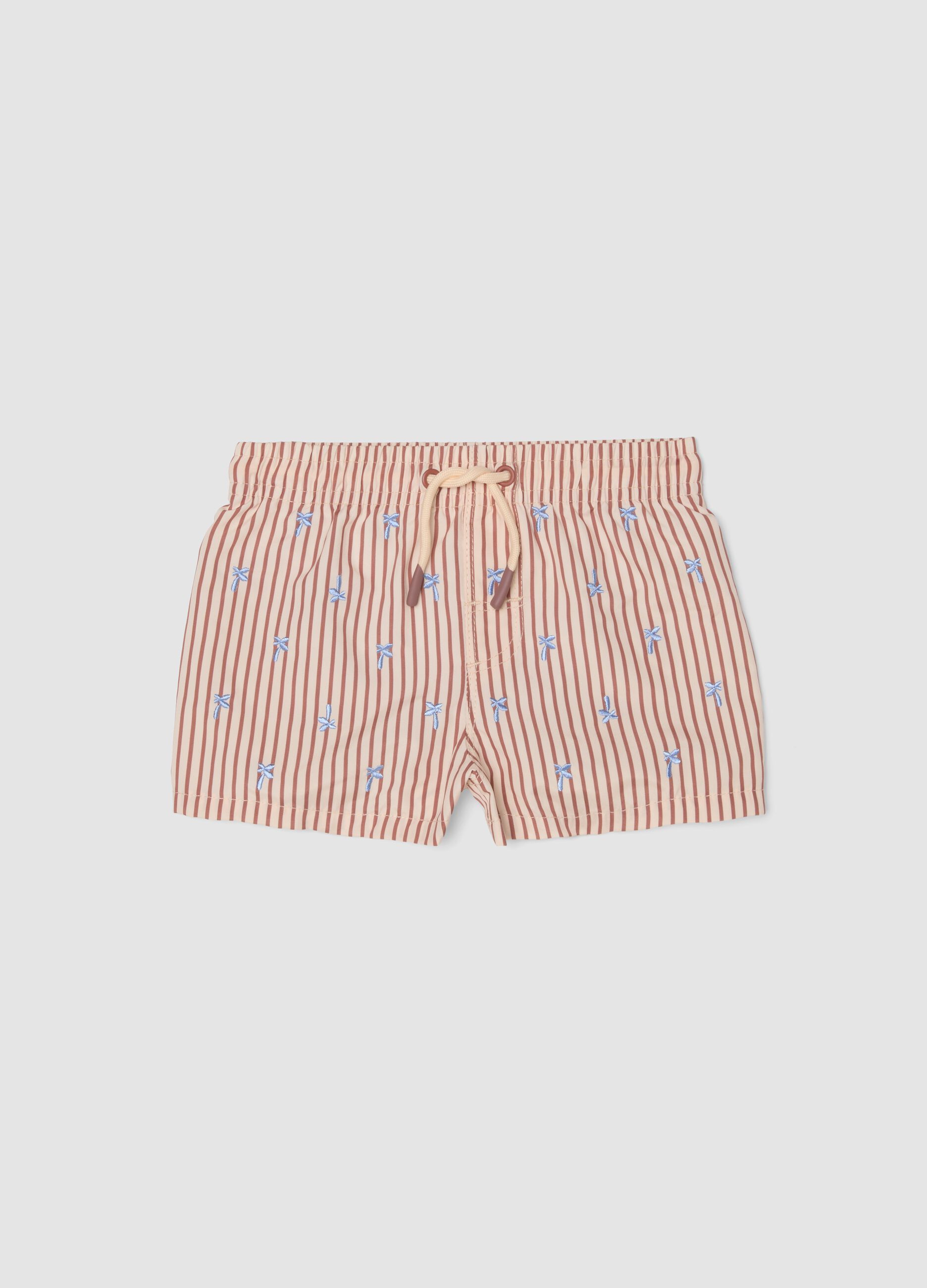 Rosafarbene Baby-Boxer-Badehose mit Streifen und Stickereien