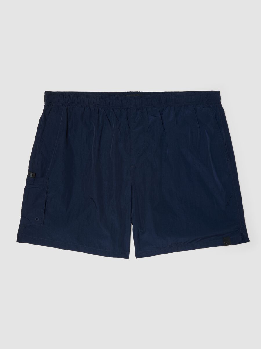 Blue swim shorts with elasticated waistband_0