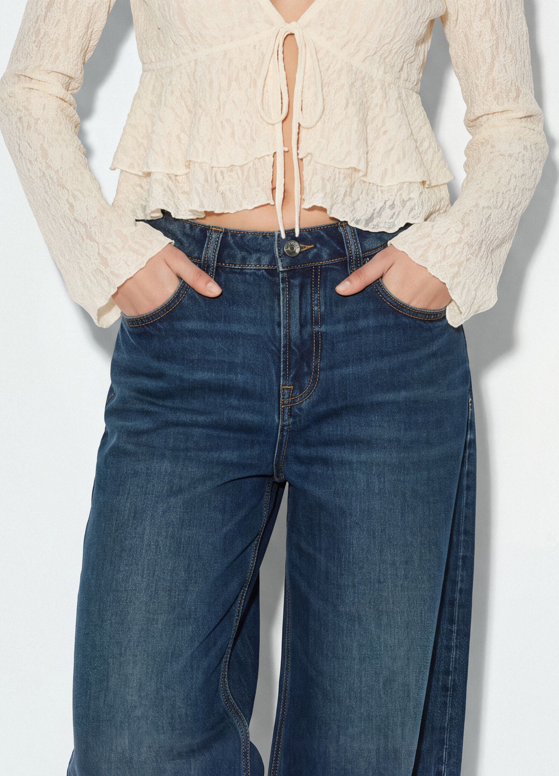 Blue denim jeans in 100% cotton with super wide-leg fit