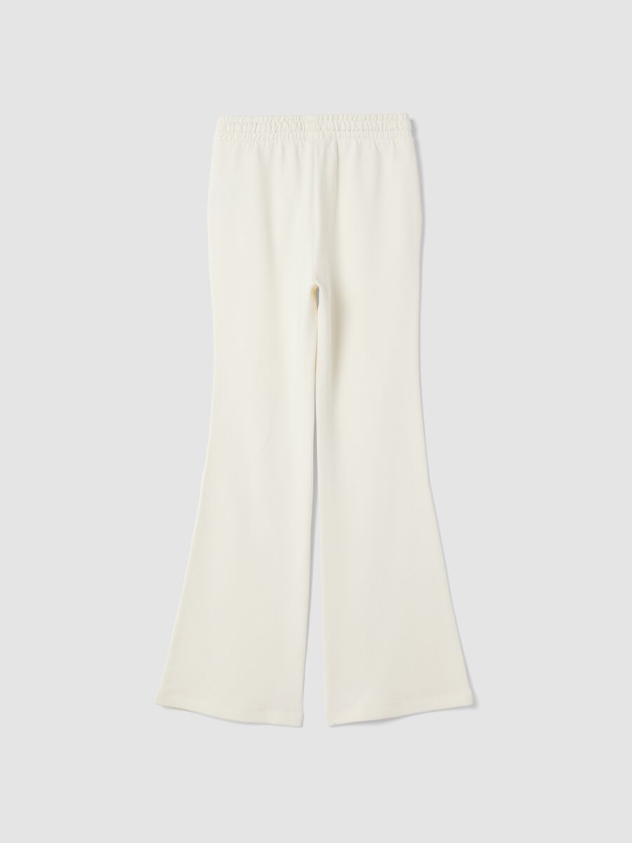 White flare trousers in pure organic cotton_1