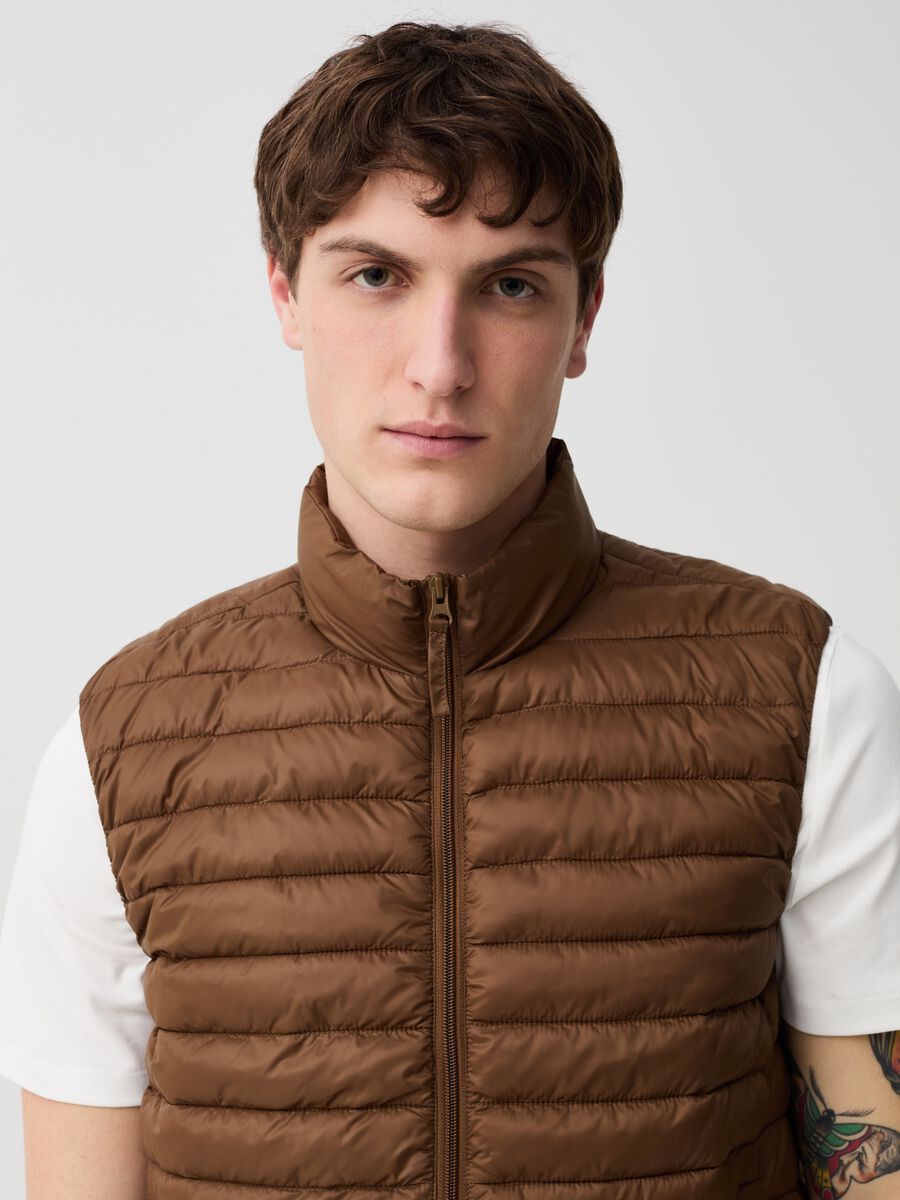 Ultralight quilted gilet with high neck_1
