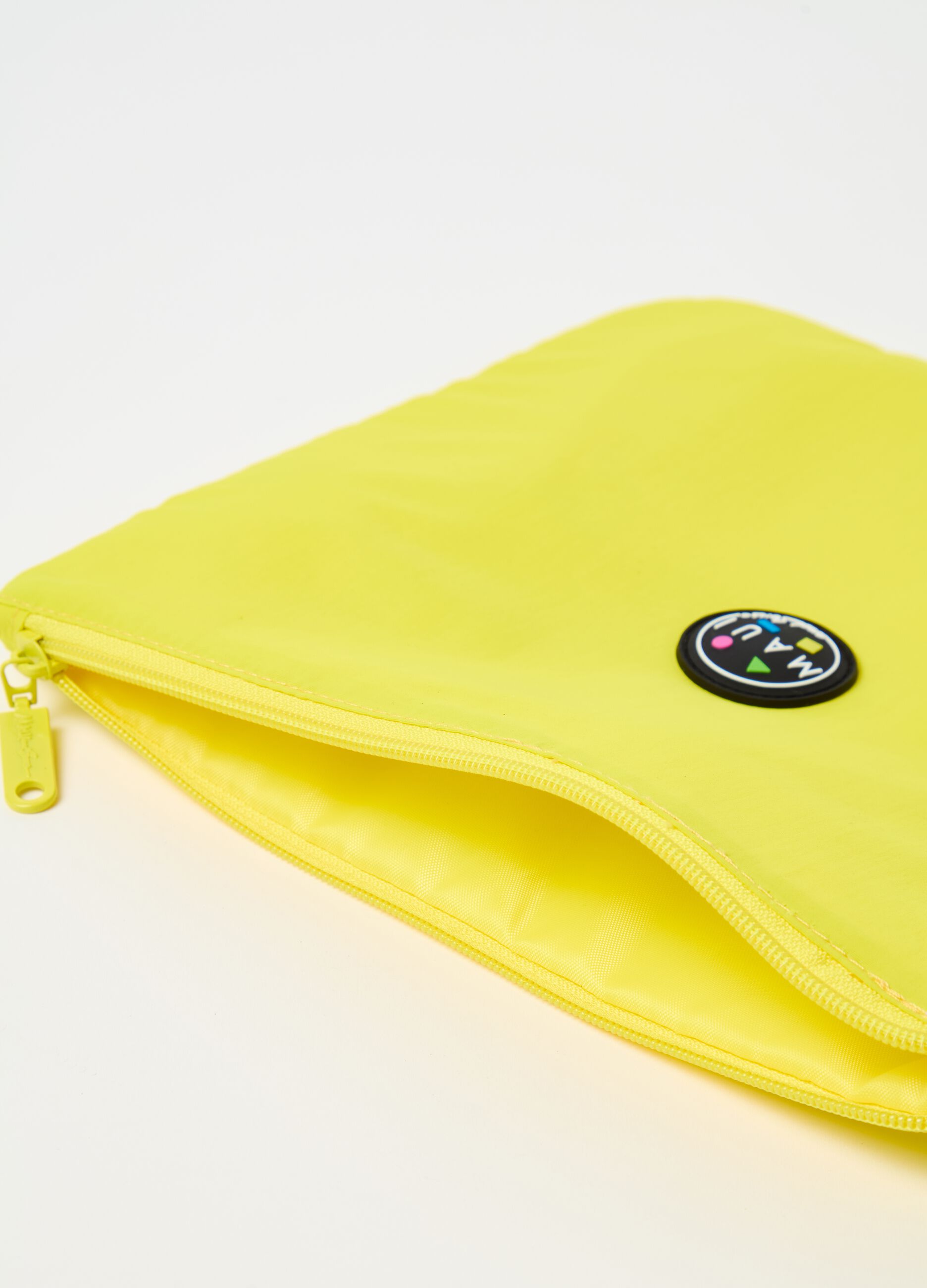 Solid colour clutch bag with logo patch