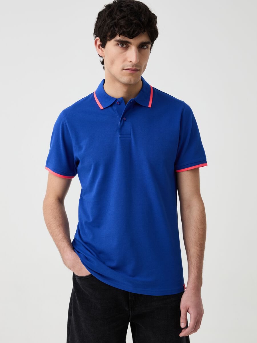 Solid colour polo shirt with fluorescent edging_0