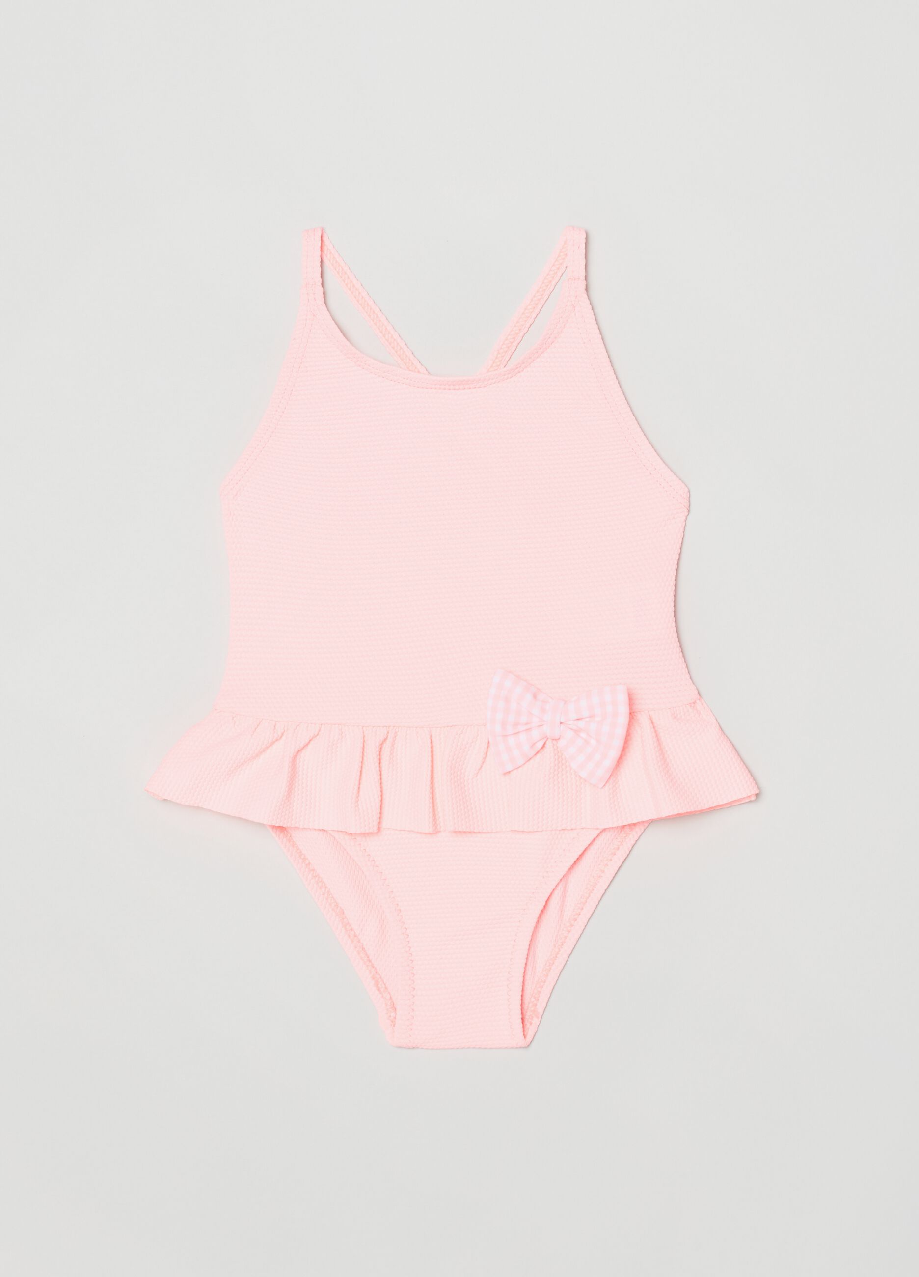 One-piece swimsuit with bow and frills