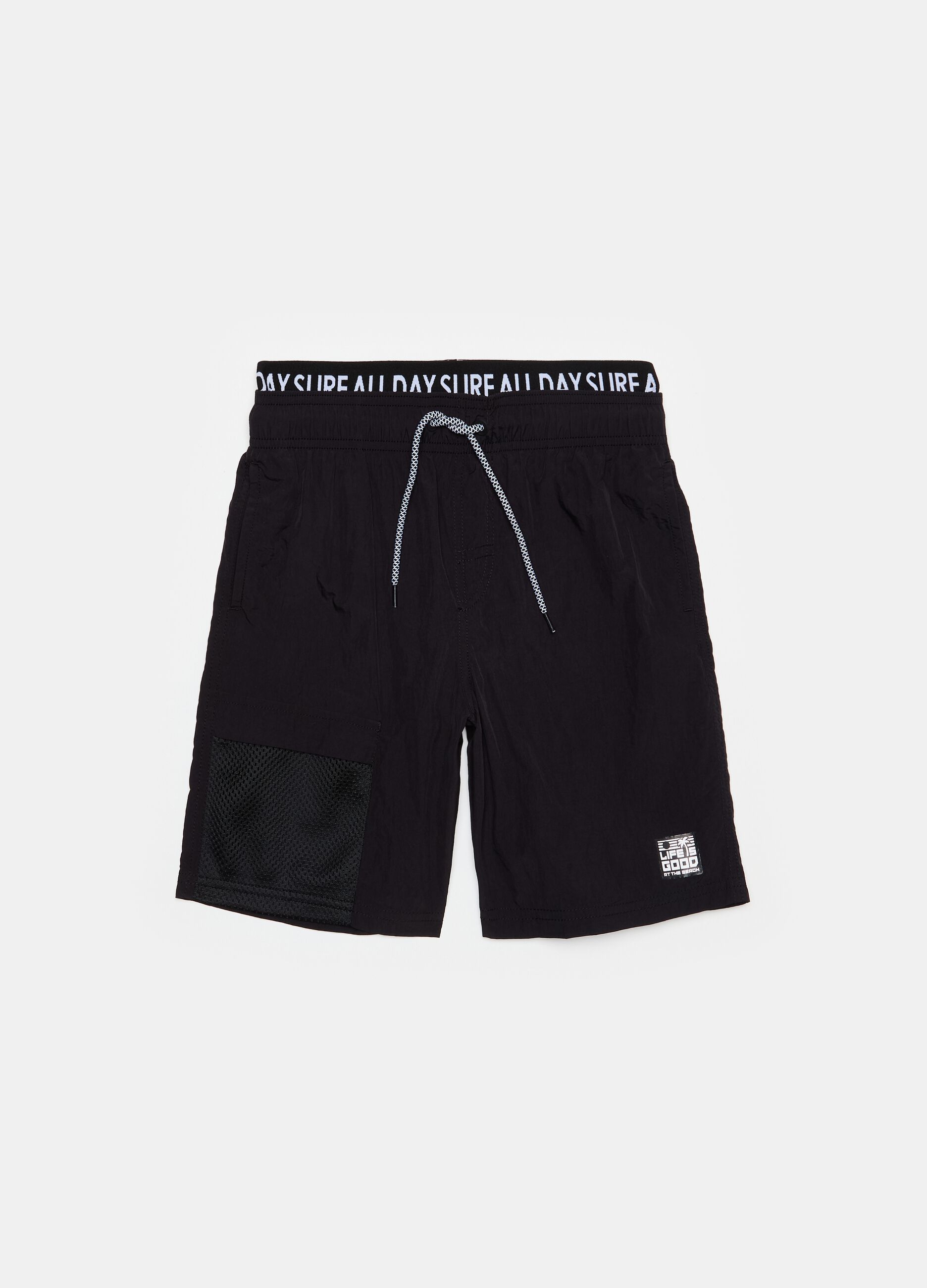 Swimming trunks with external elastic