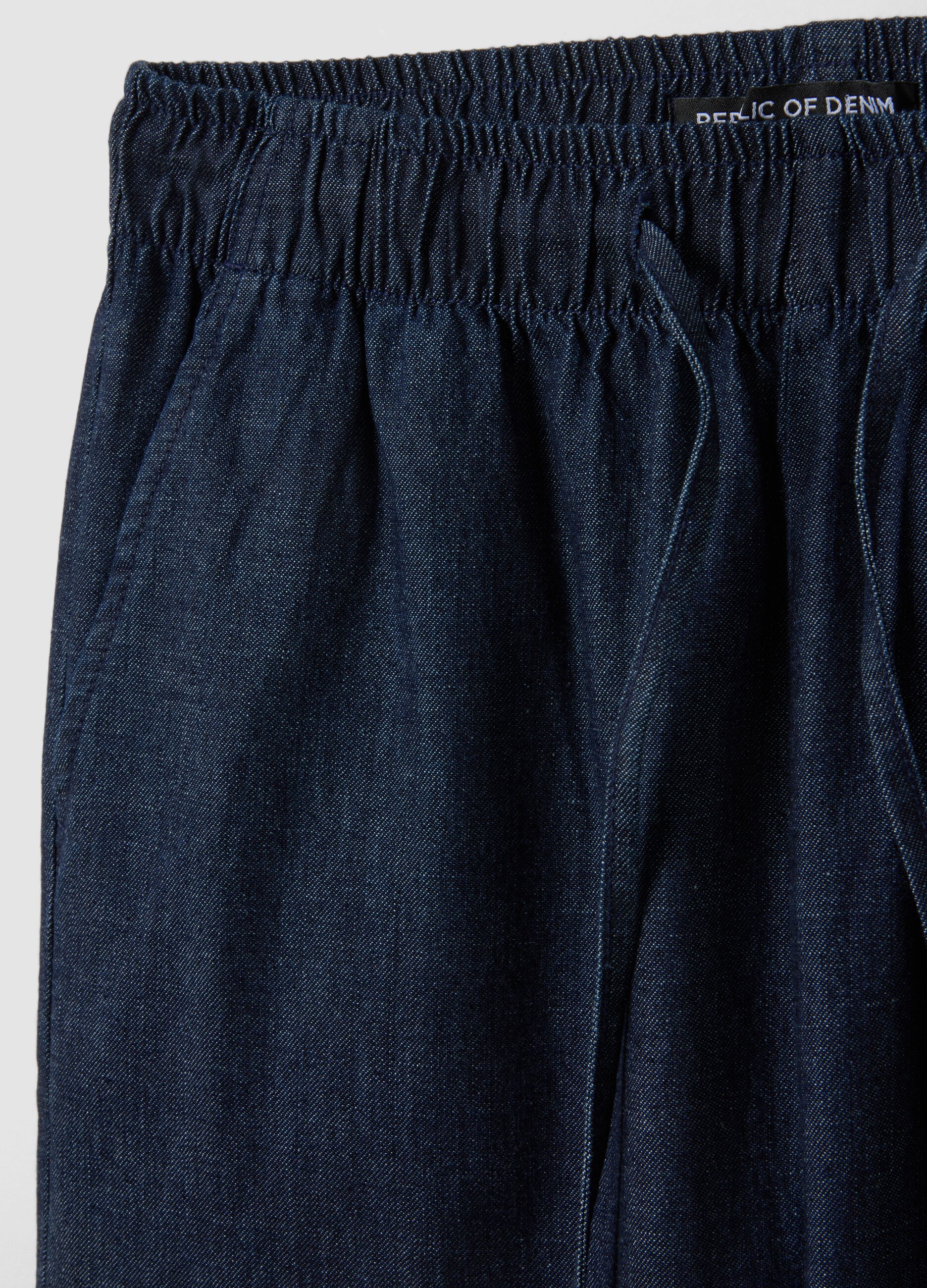Pantaloni denim blu in puro cotone wide leg con coulisse