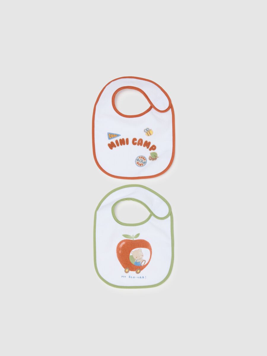 Two-pack white cotton blend bibs with velcro and prints_0