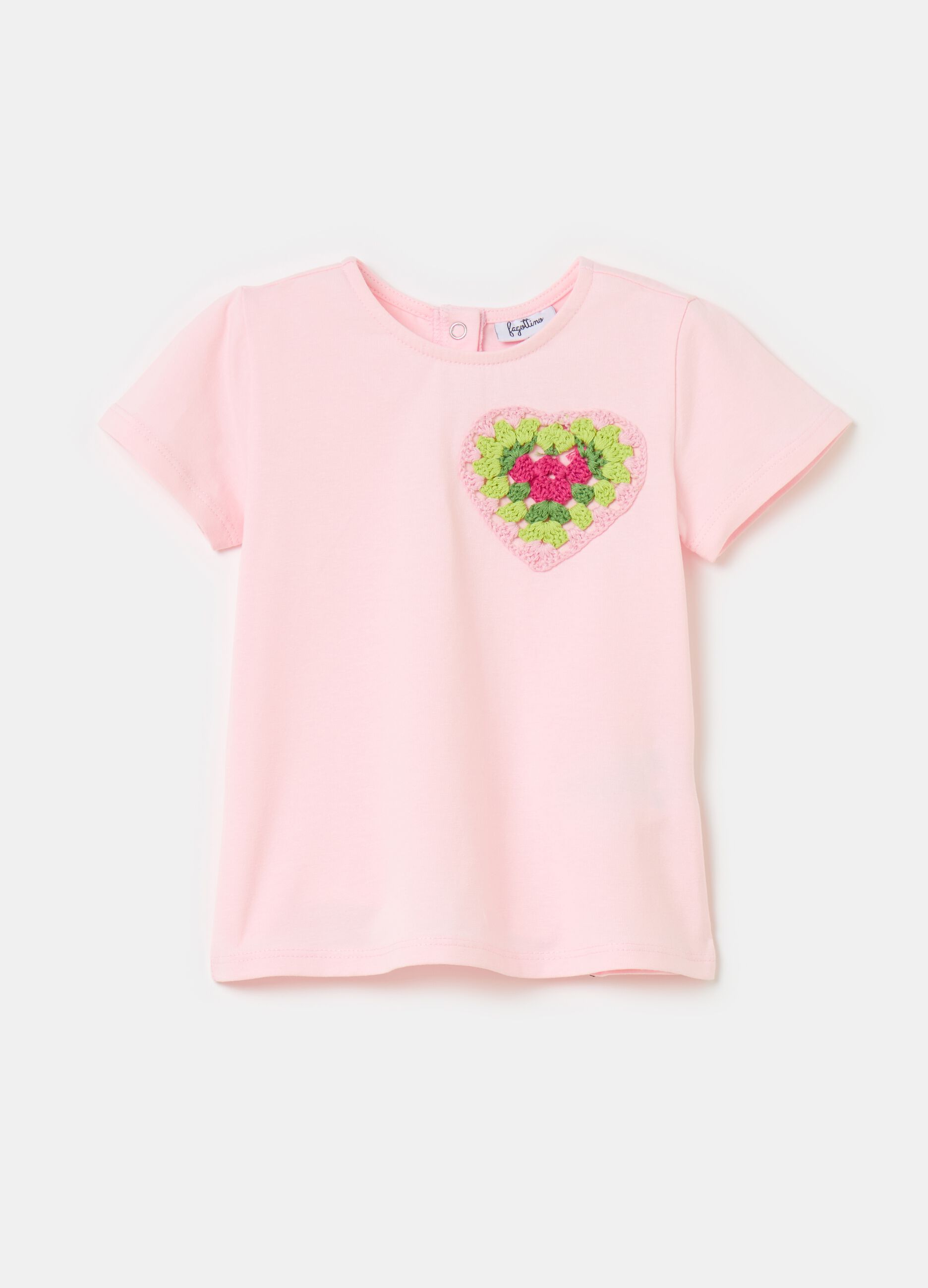 T-shirt with crochet heart application