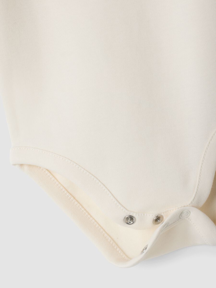3-pack ivory and light pink organic cotton crew-neck bodysuits_2
