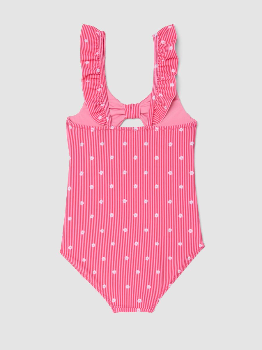 Pink striped stretch swimsuit with ruffle straps_1