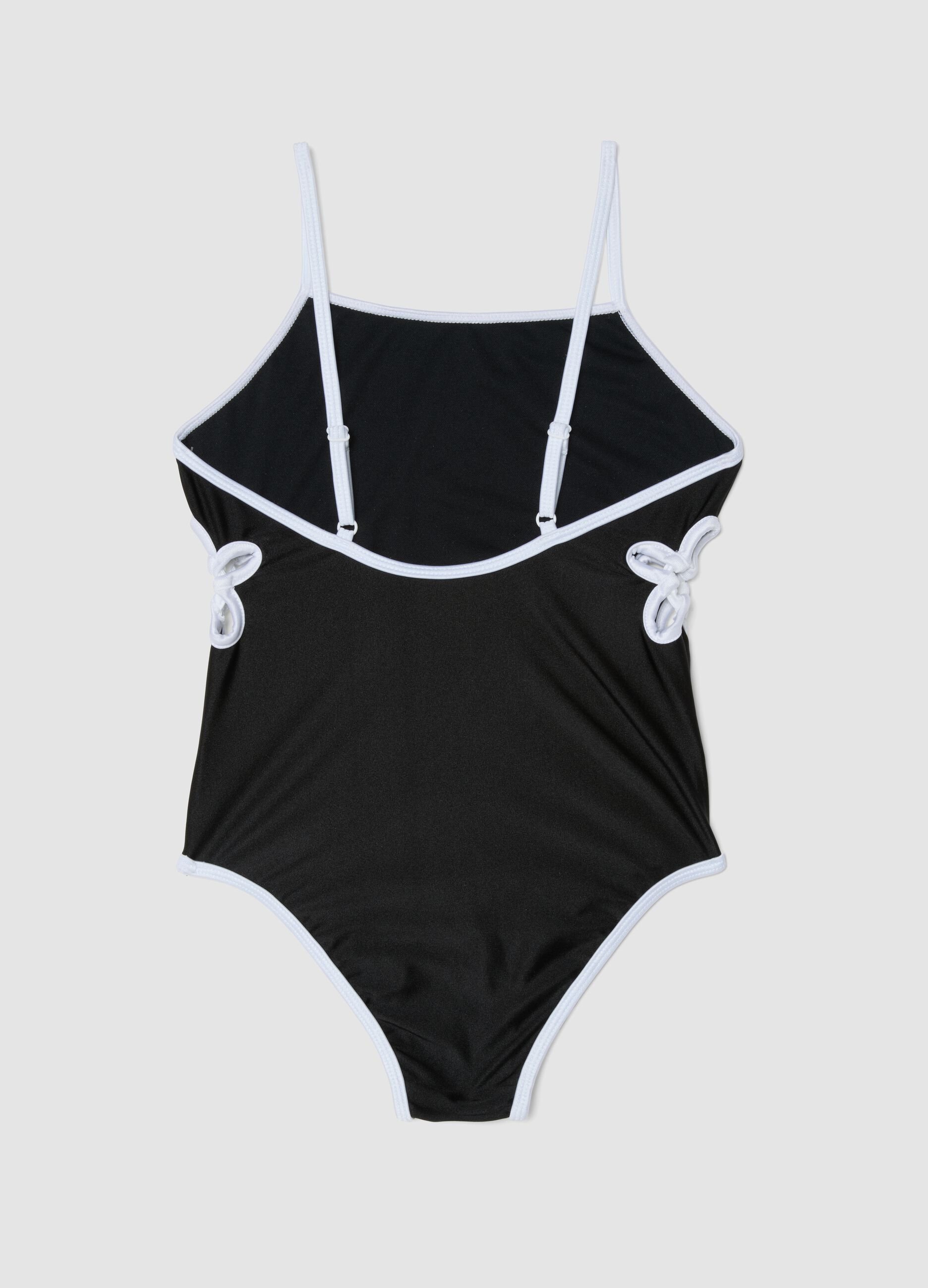 Black stretch one-piece swimsuit with contrasting trim