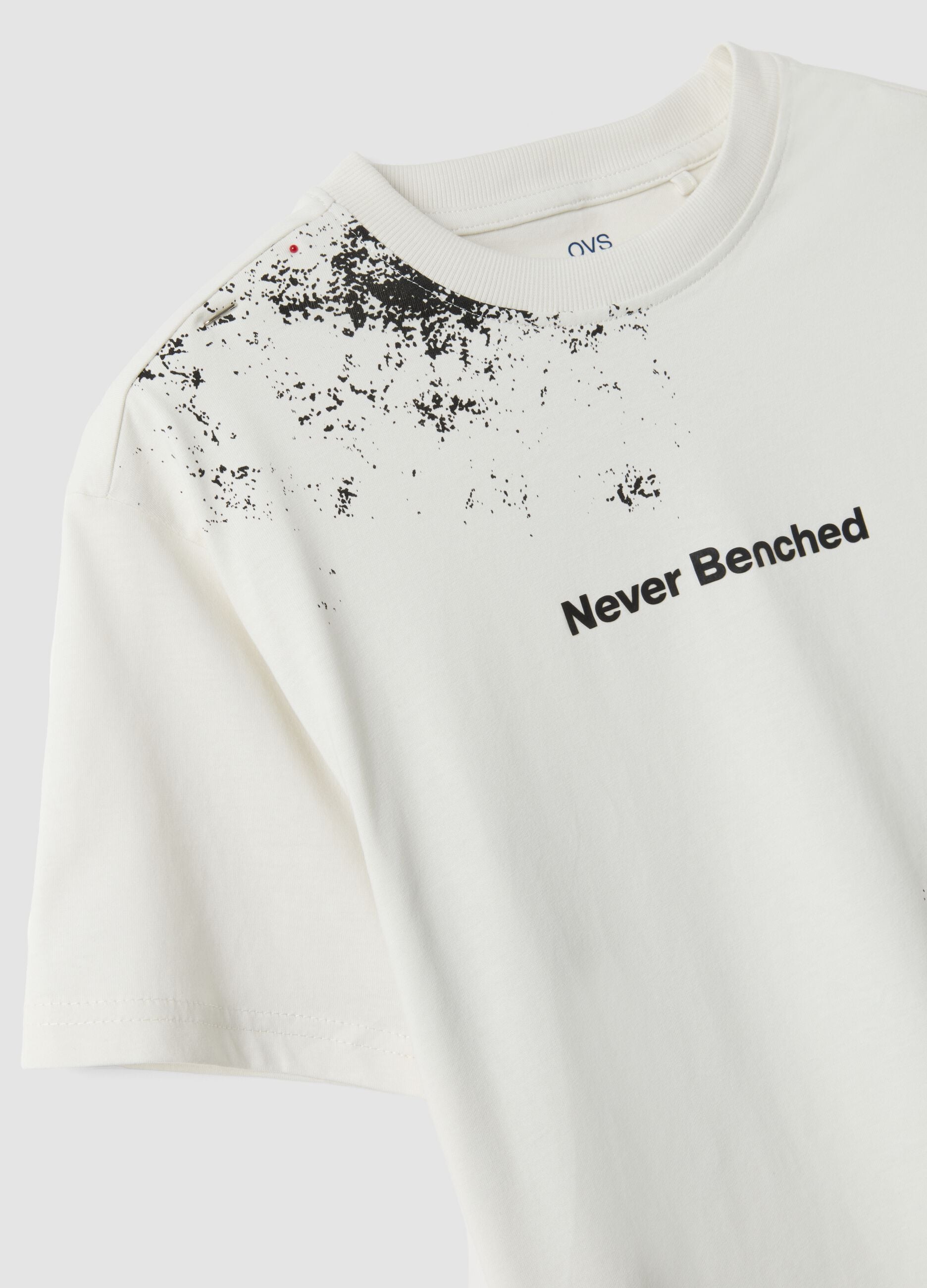 White oversized pure cotton T-shirt with "Never Benched" slogan for boys