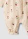 Tutina beige in puro cotone organico con stampa floreale per neonata_2