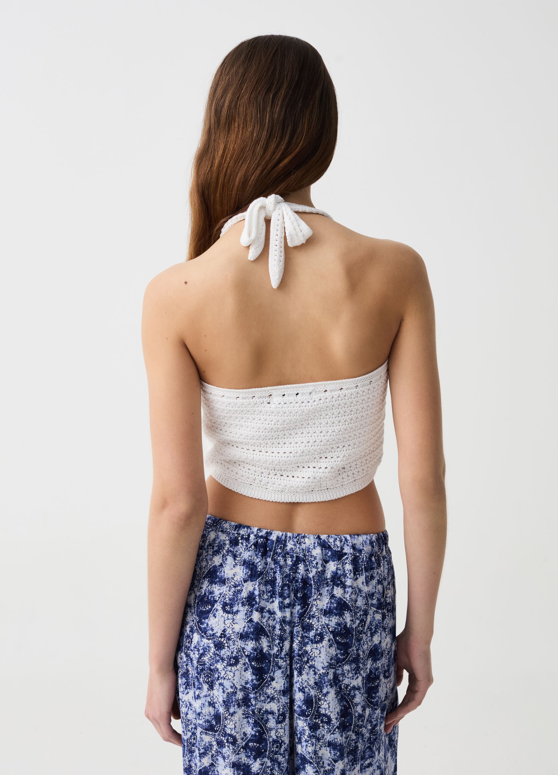 Crochet crop top with flowers embroidery