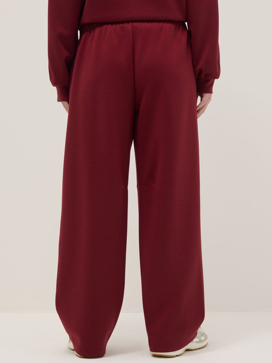 Cal&ccedil;as vermelhas de algod&atilde;o el&aacute;stico com ajuste relaxado_2