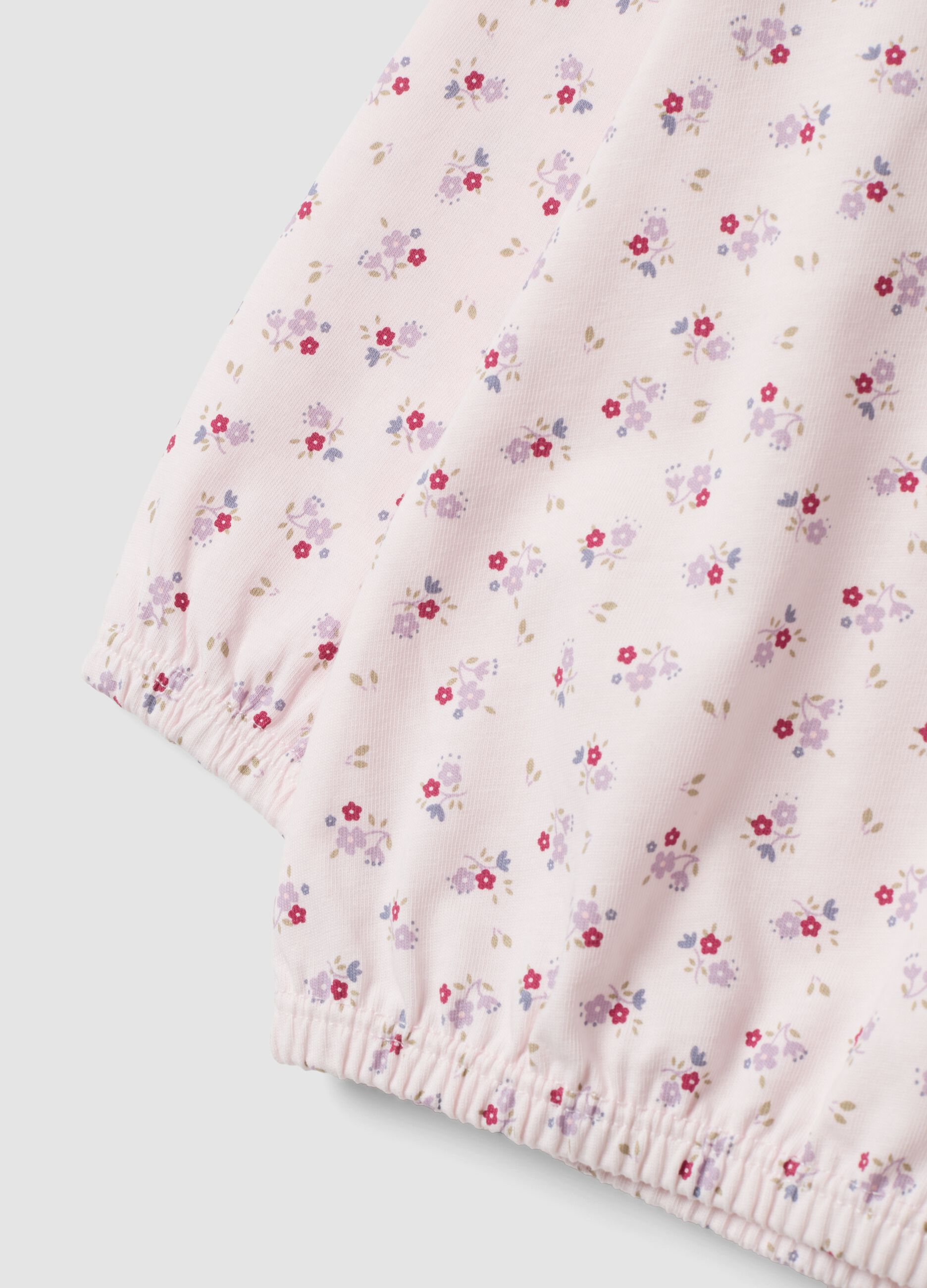 Pigiama rosa in puro cotone jersey organico con fantasia floreale per neonata e bimba