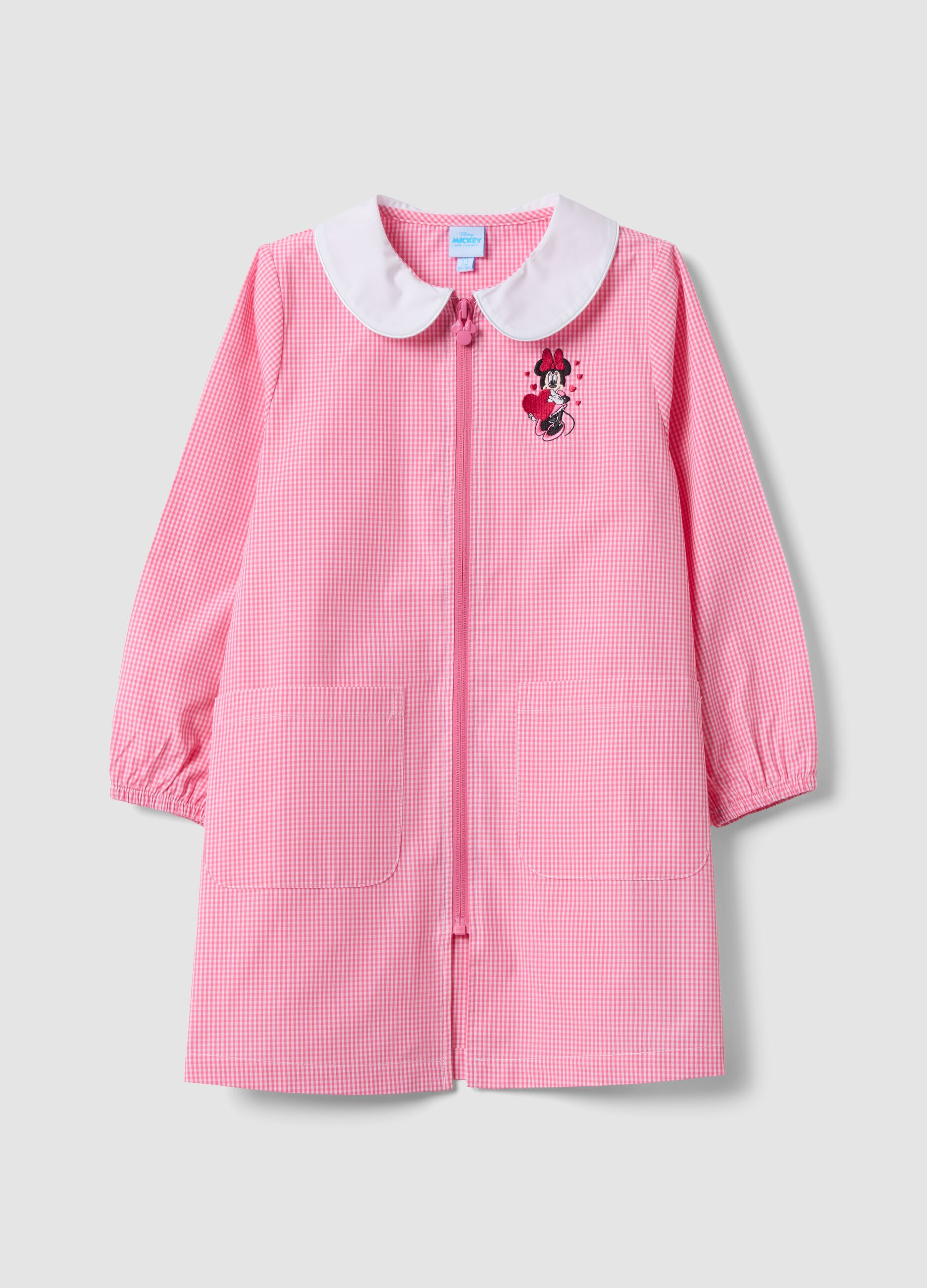 Pink gingham nursery apron with white collar and Minnie embroidery