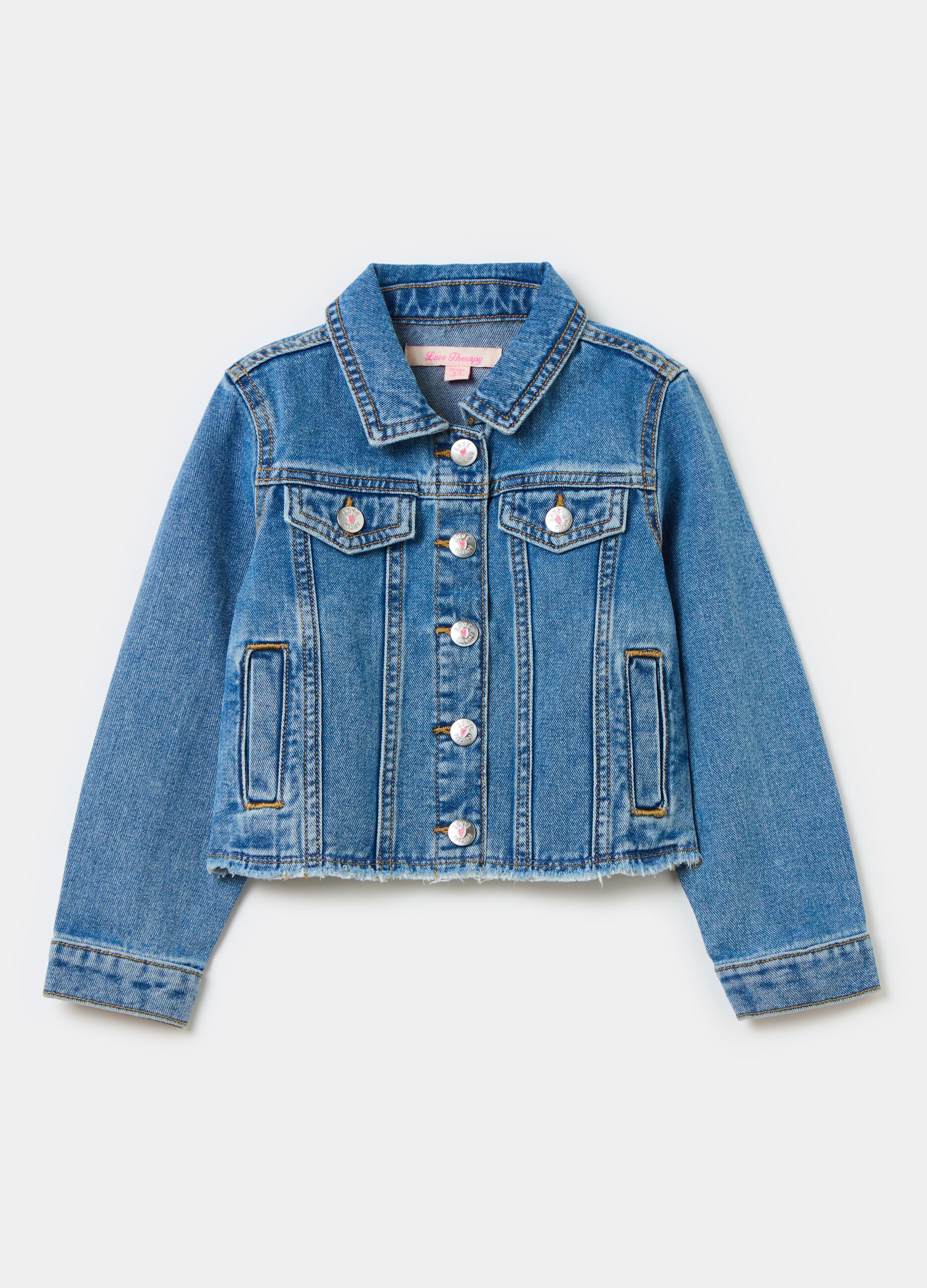 Denim jacket with heart patch