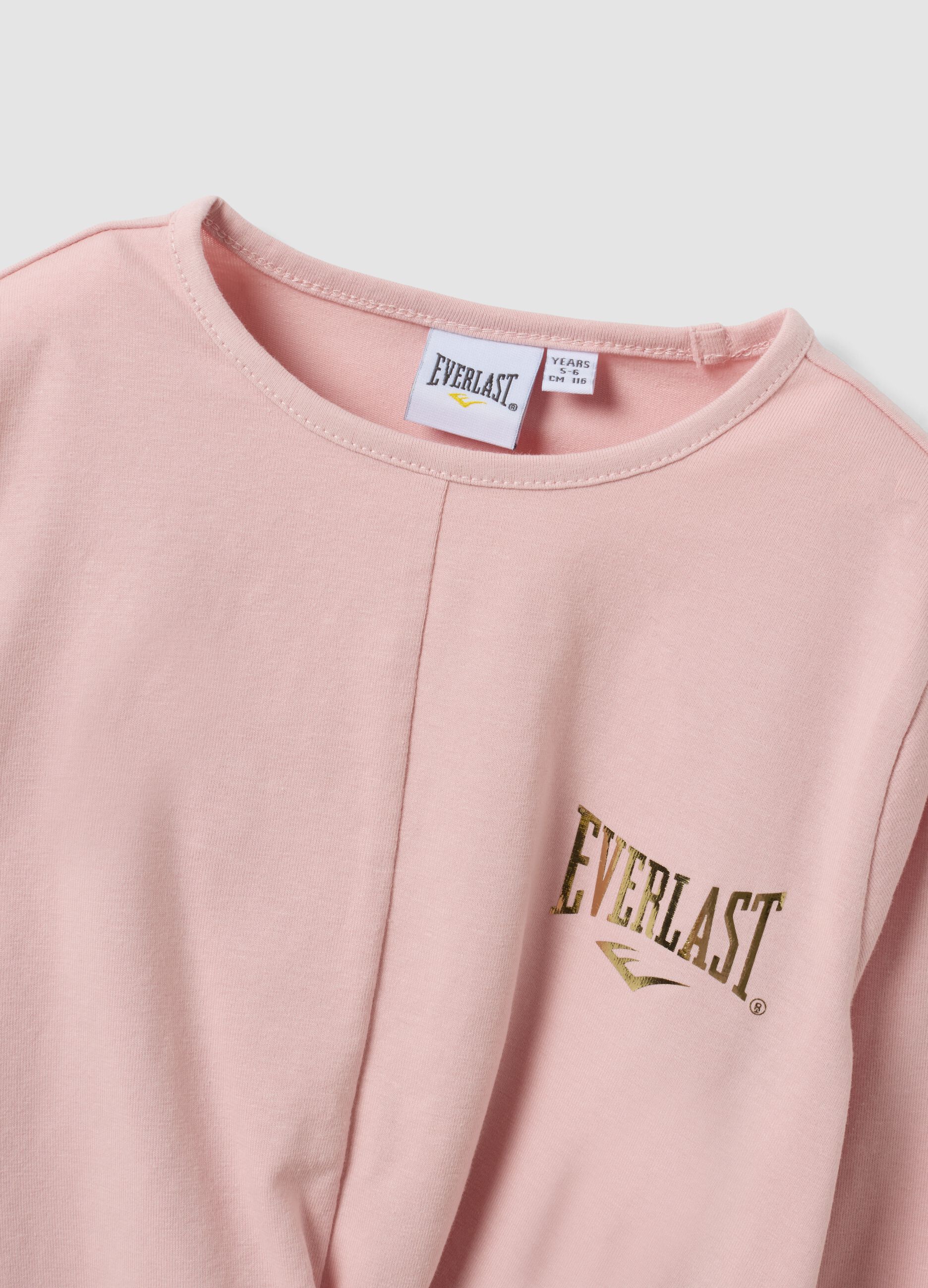 T-shirt rosa in cotone elasticizzato con nodo frontale e stampa per bambina
