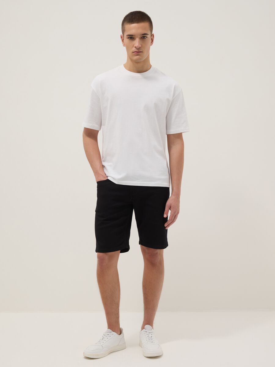 Black slim-fit stretch cotton denim Bermuda shorts_0