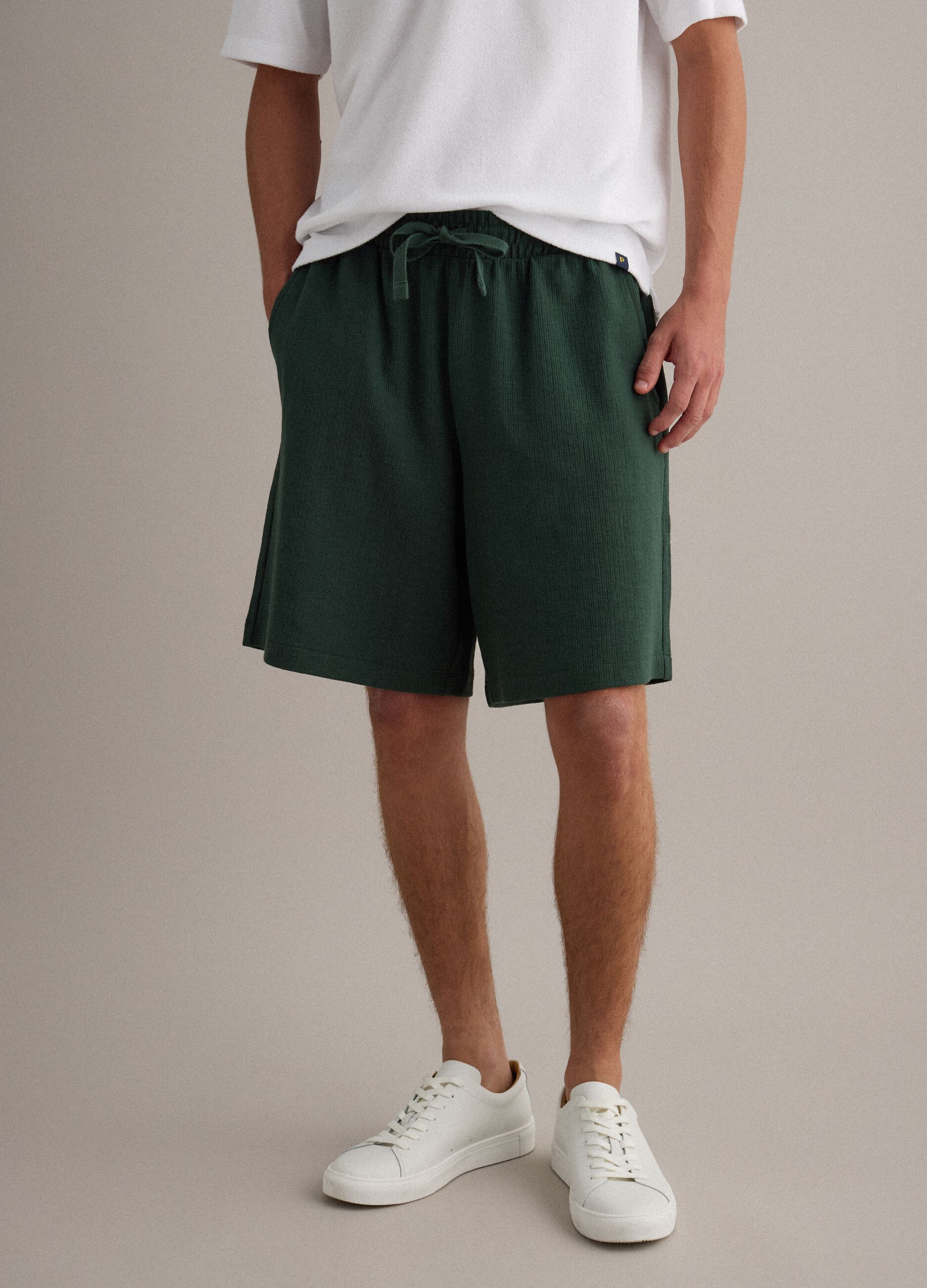 Green cotton-blend jogger shorts with drawstring, relaxed fit