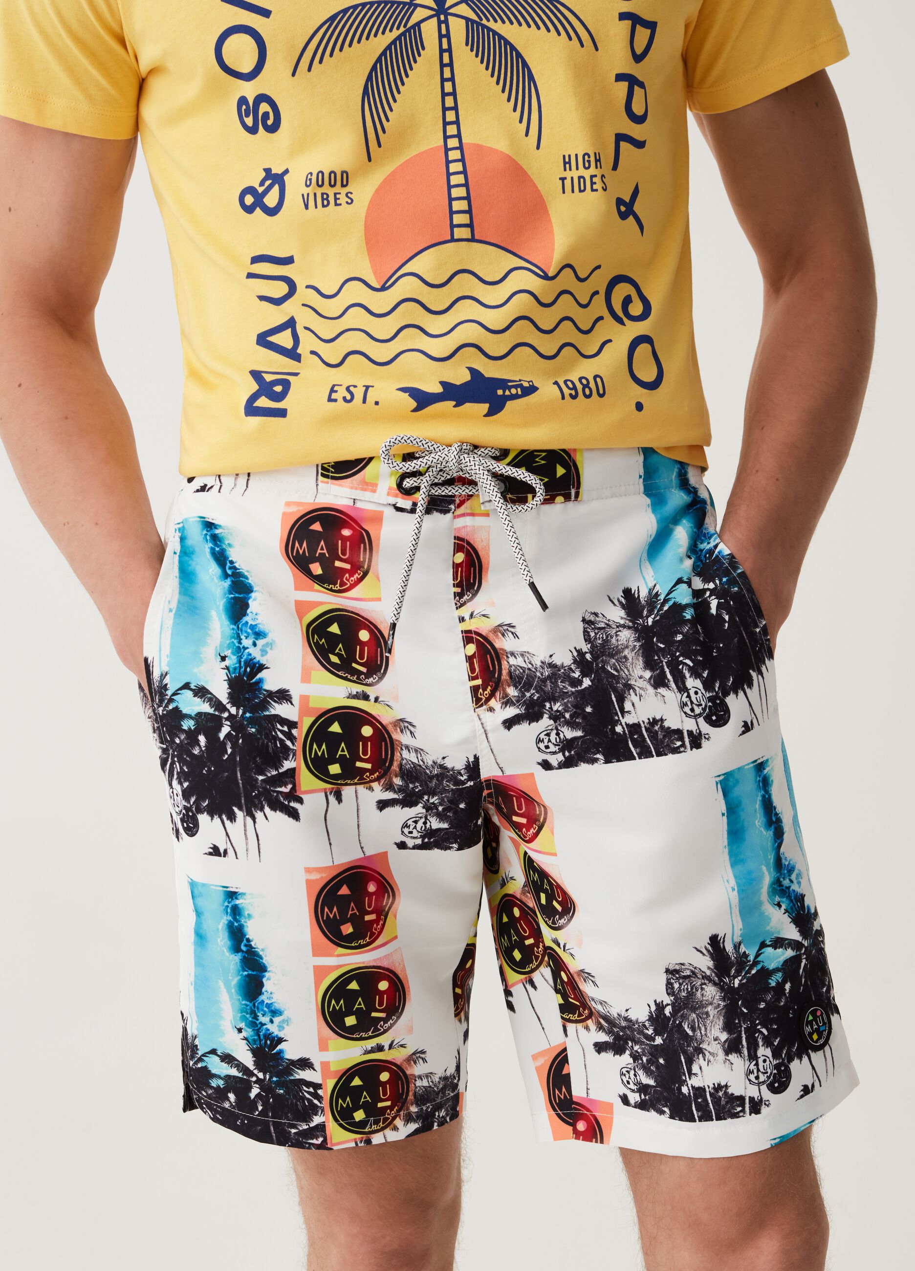 Maui and Sons Bermuda swimming trunks with palms print