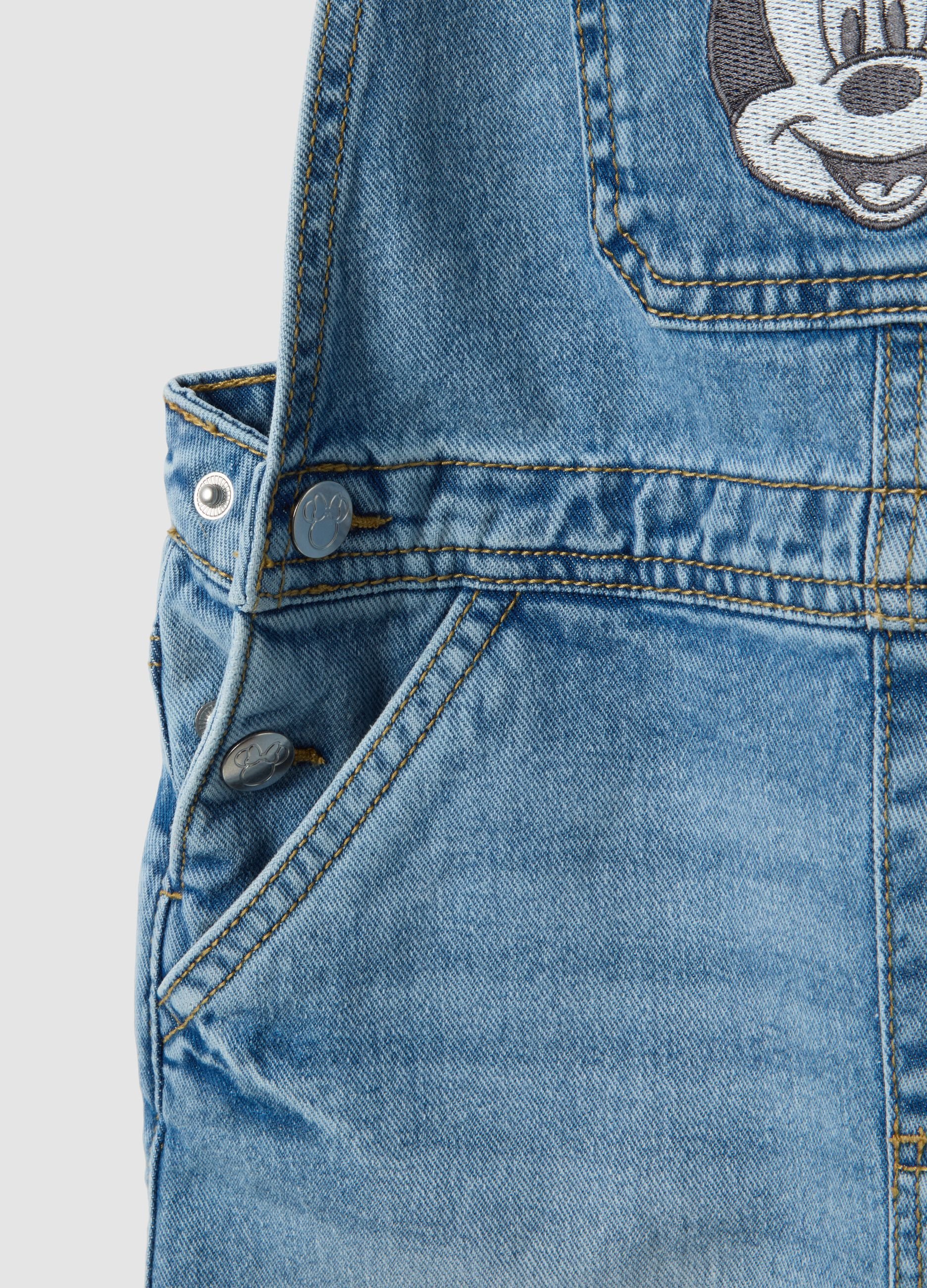 Girls&rsquo; blue denim dungarees in 100% cotton with Minnie embroidery