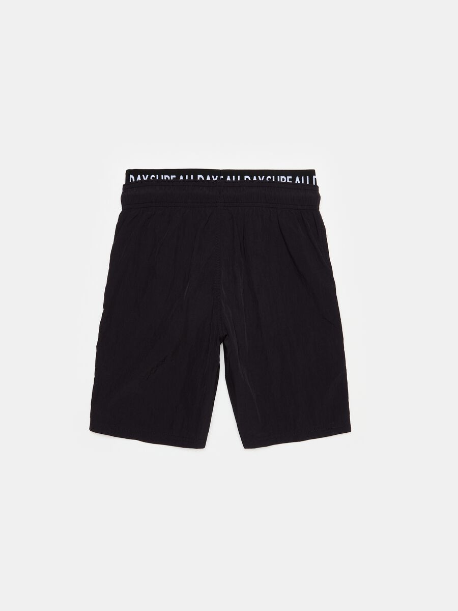 Swimming trunks with external elastic_1