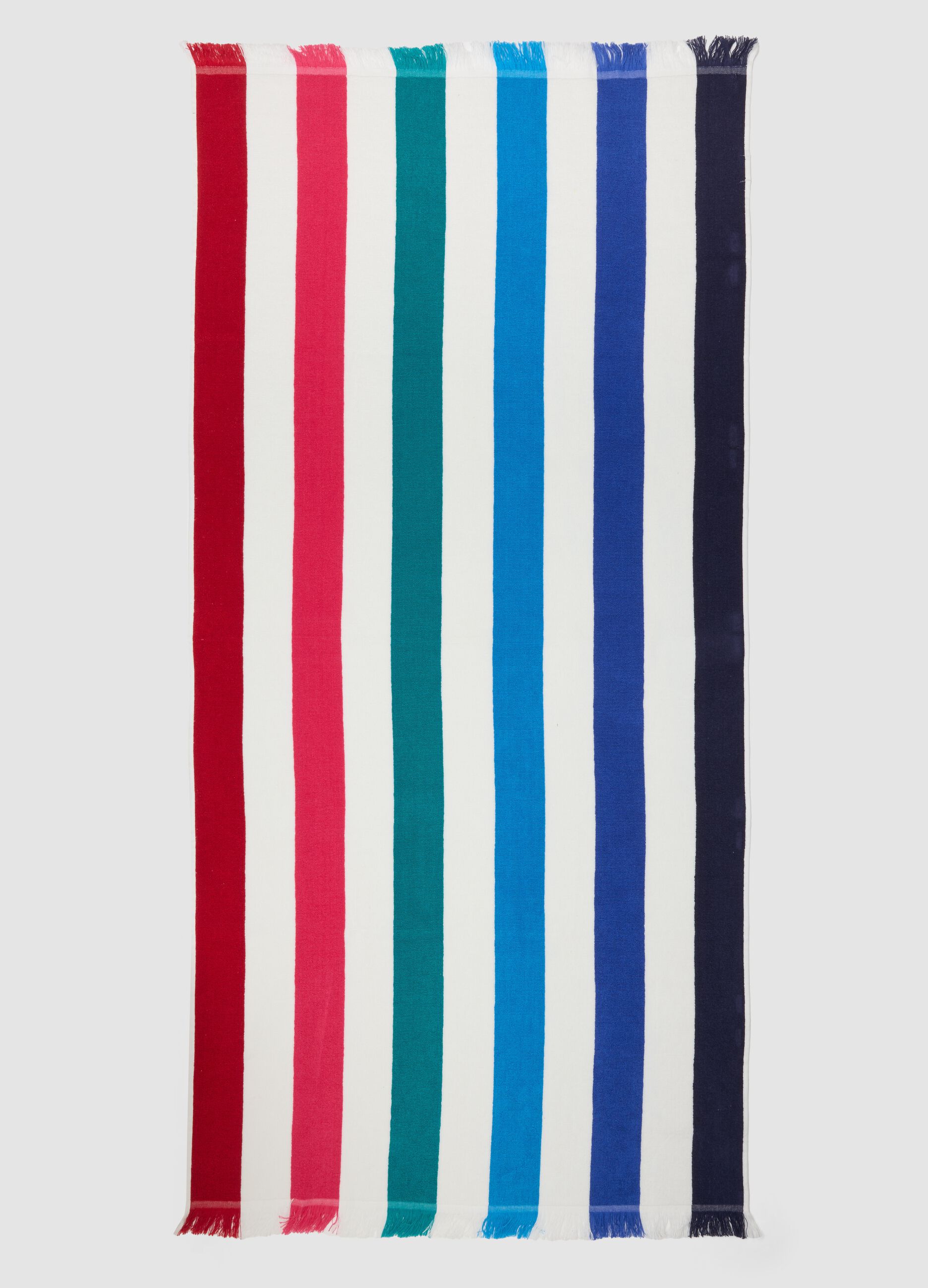 Telo mare multicolor in puro cotone a righe e con frange