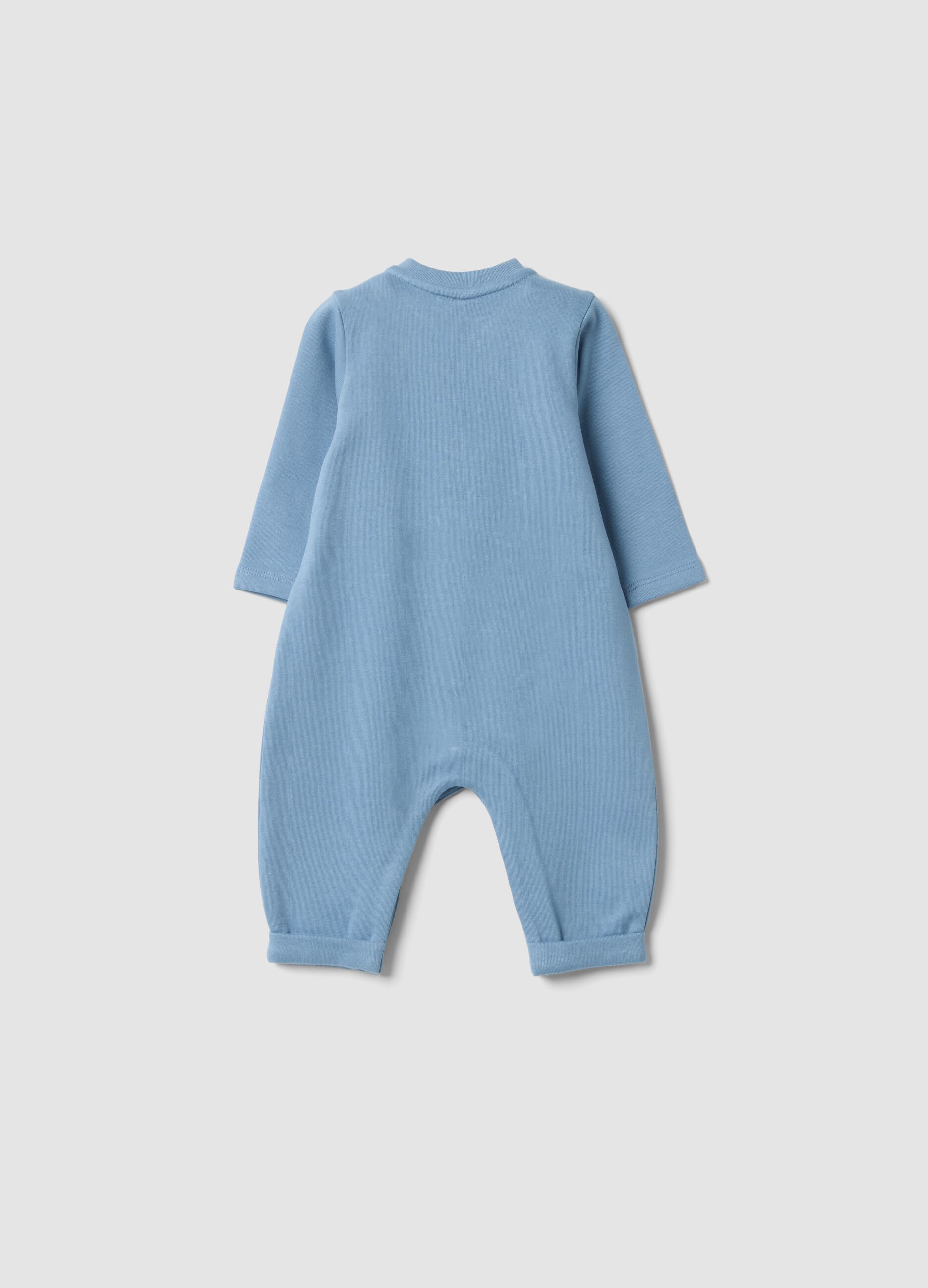 Tutina azzurra in puro cotone organico con ricamo