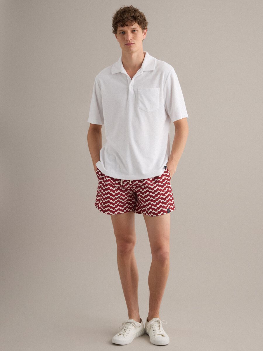 Red men&rsquo;s swim shorts with all-over print_1