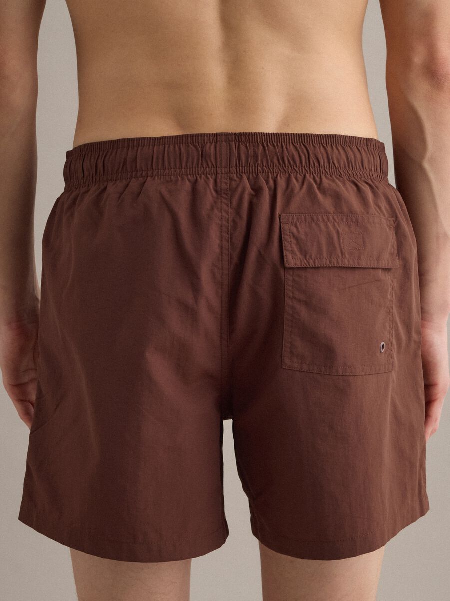 Brown swim shorts with elasticated waistband and drawstring_4